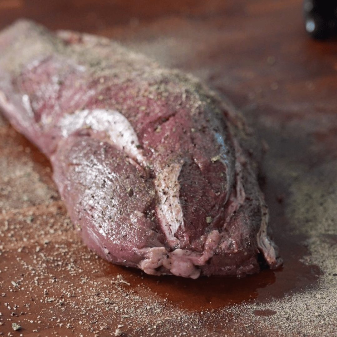 Image of Coat the bison tenderloin with olive oil and then season...