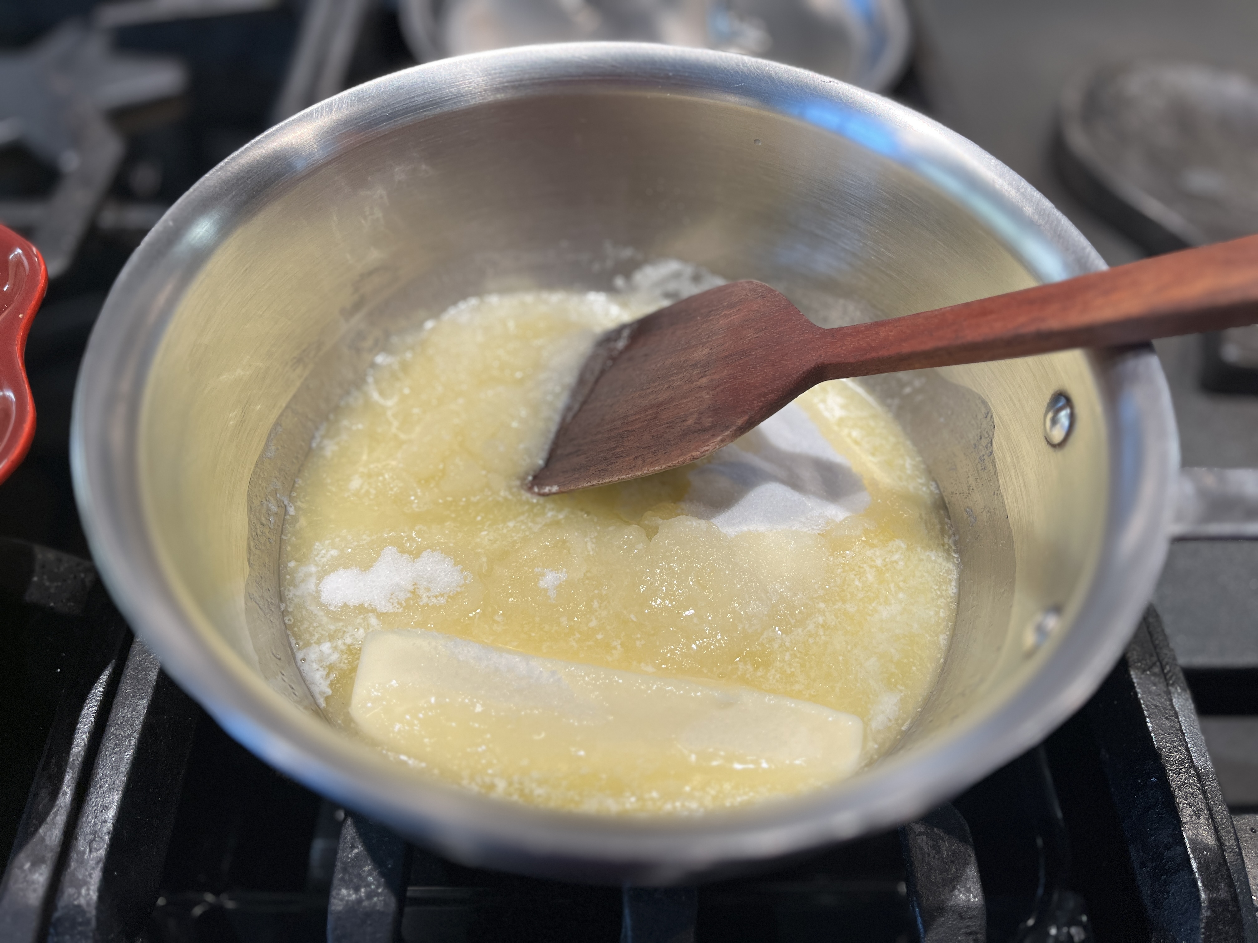 Image of Add butter, sugar and salt to heavy bottomed sauce pan....