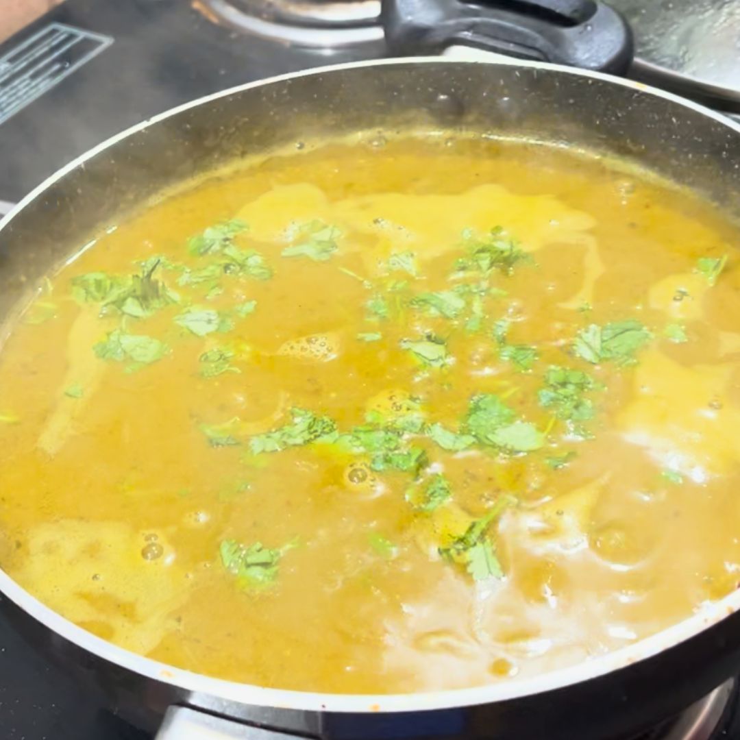 Image of Garnish the Matar Nimona with freshly chopped coriander leaves