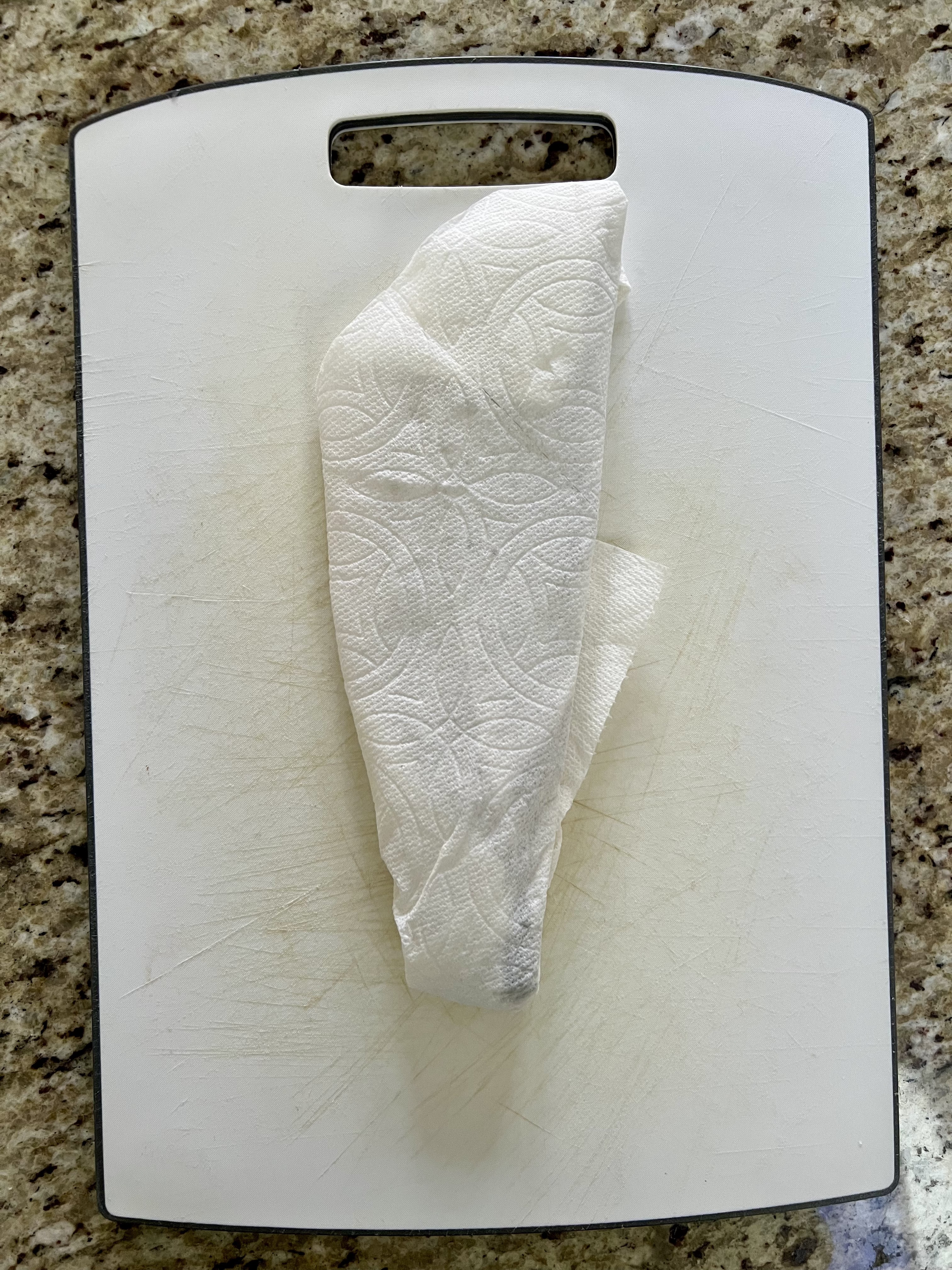 Image of Wrap each fillet in paper towels or tuna paper to...