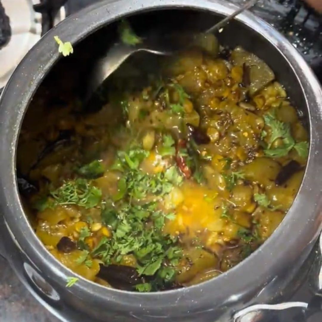 Image of Garnish with additional chopped coriander leaves.