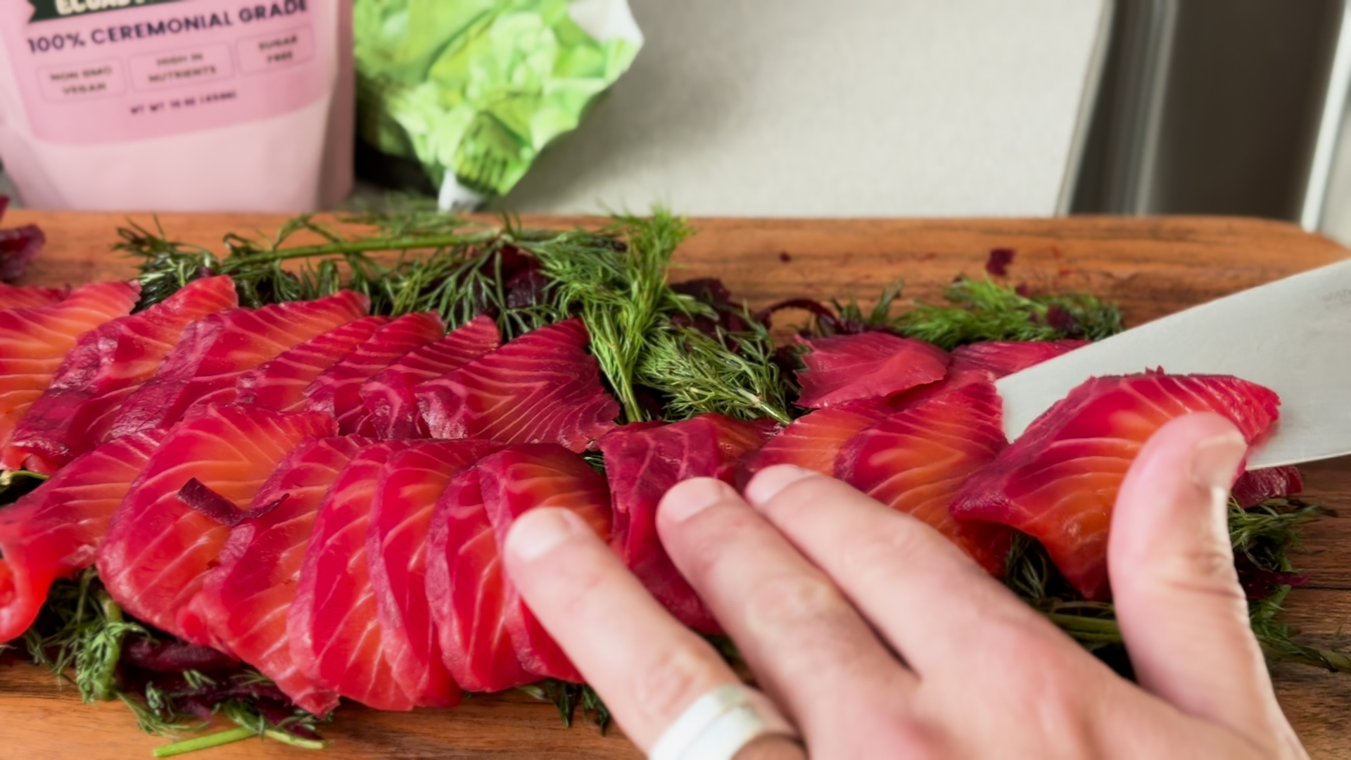 Image of Prepare the Plate: Arrange the sliced lox on a bed...