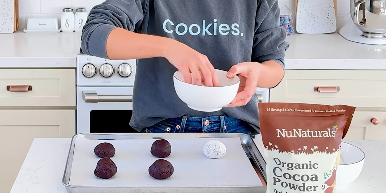 Image of Using your hands, form the dough into 12 balls and...