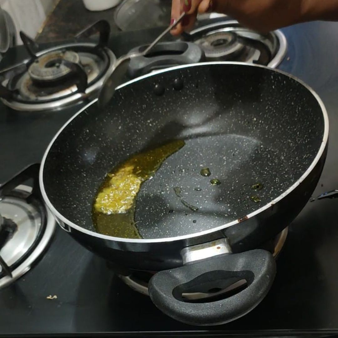 Image of Heat oil in a pan, add cumin seeds and mustard...