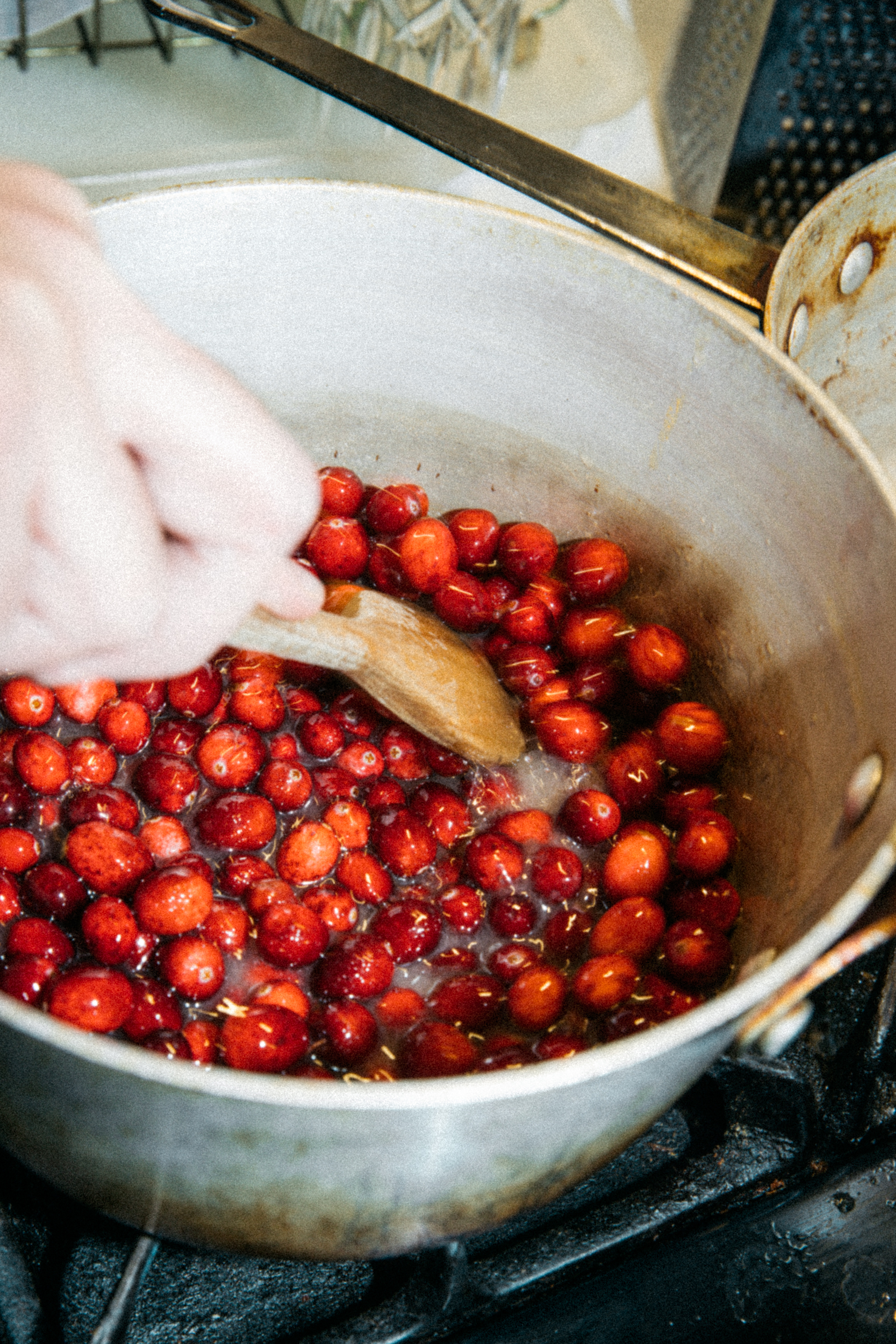 Image of Make the Cranberry-Pomegranate SauceCombine cranberries, pomegranate seeds, sugar, and water...