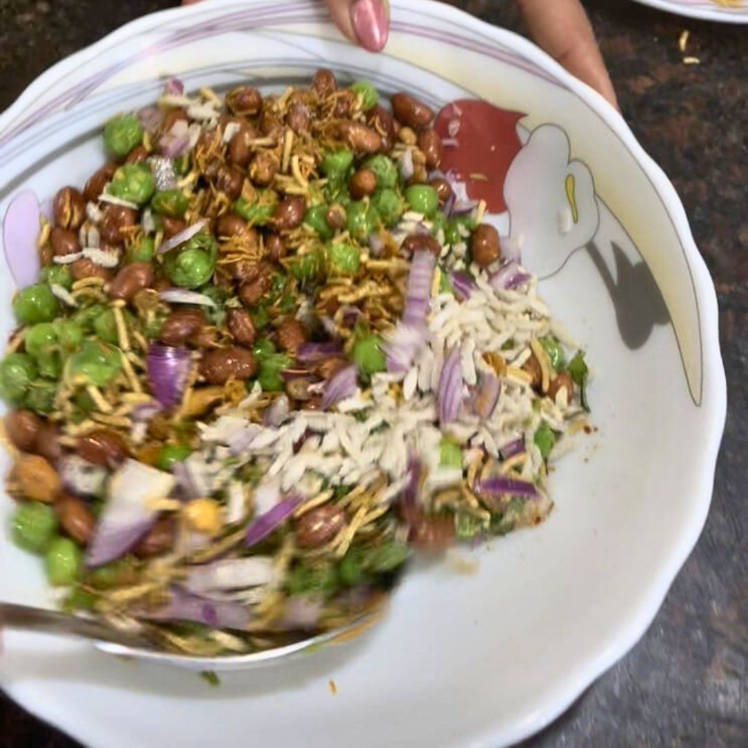 Image of Toss the ingredients gently to coat the poha evenly with...