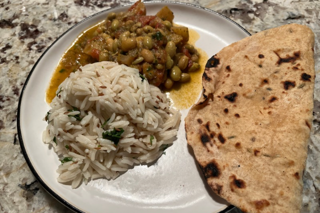 Image of Serve with rice and roti. 