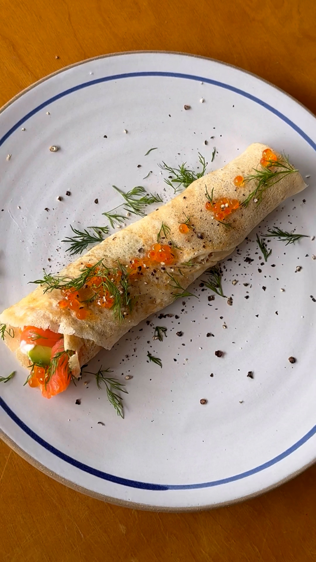 Image of Garnish with fresh dill, salmon pearls and a sprinkle of...