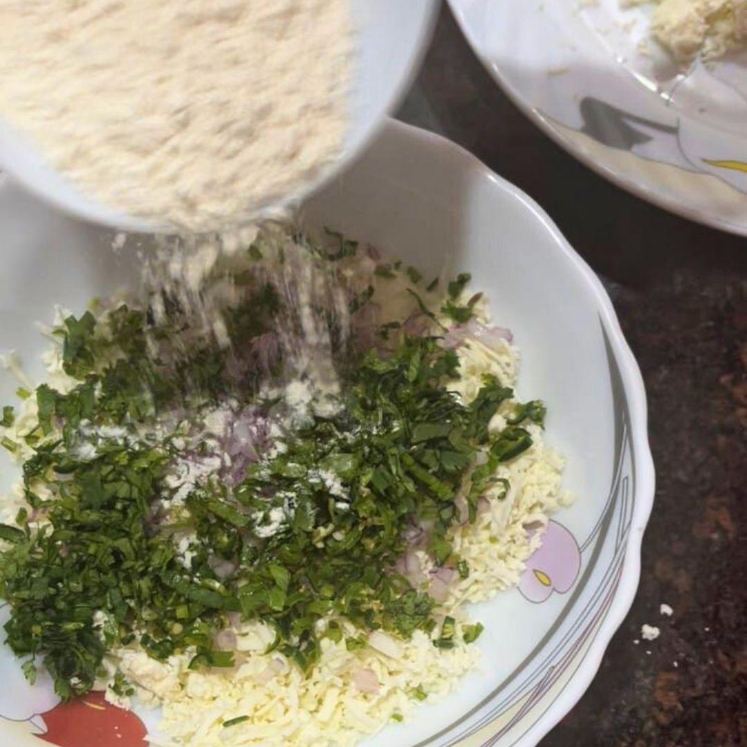 Image of In a mixing bowl, combine grated paneer, all-purpose flour, green...