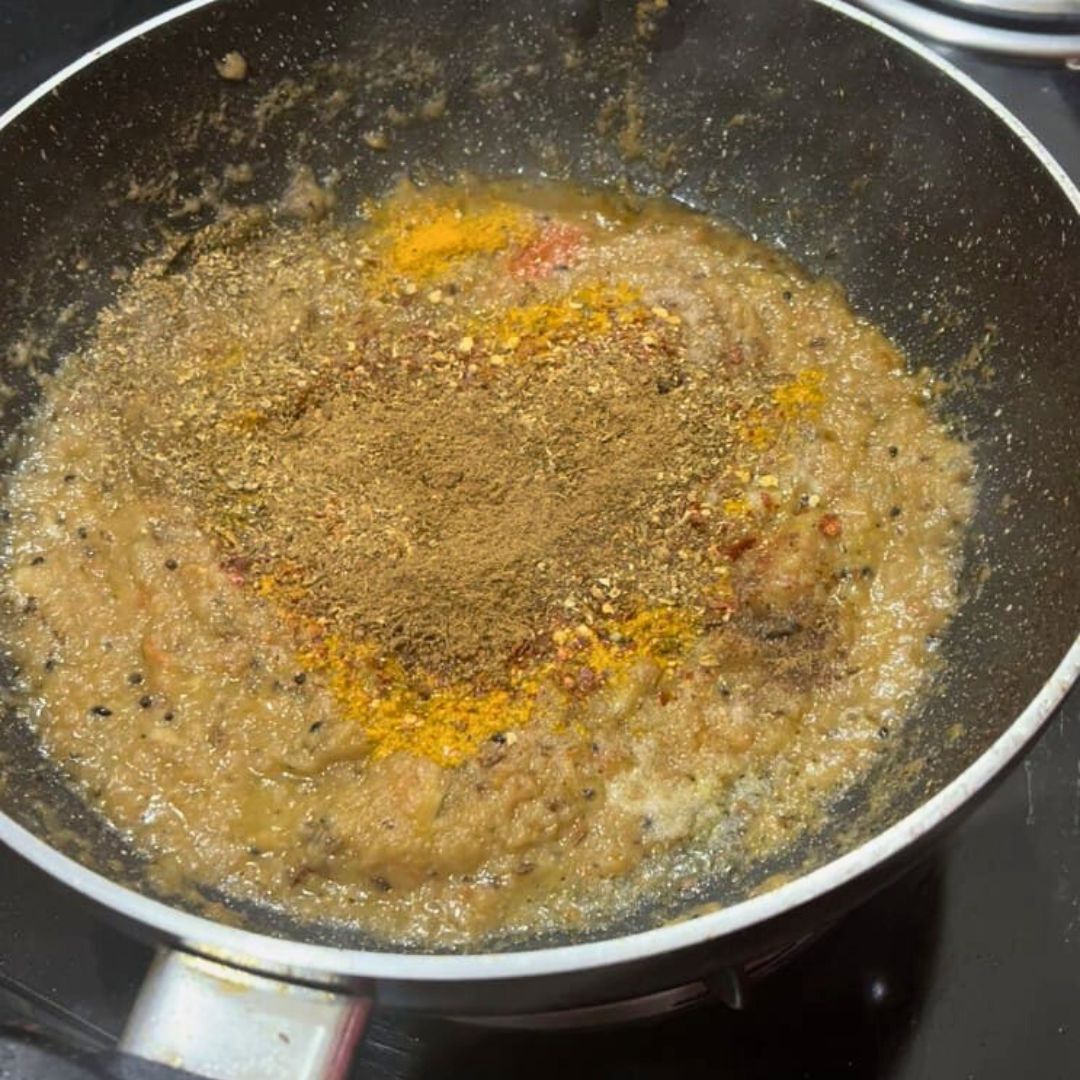 Image of Add turmeric powder, red chili powder, coriander powder, cumin powder,...