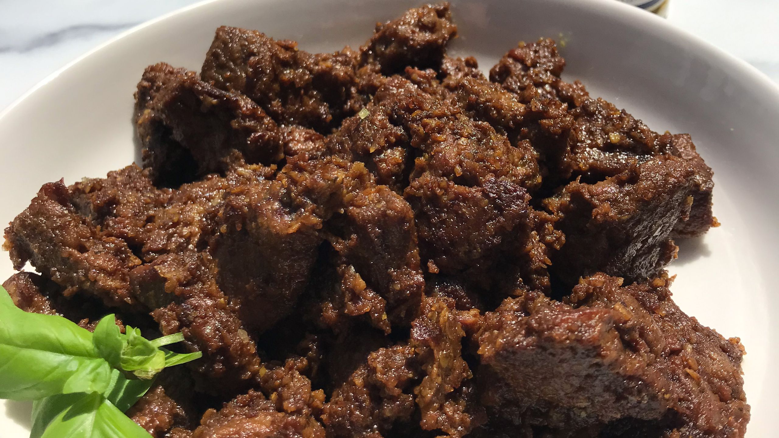 Image of Serve and Enjoy:Garnish your Beef Rendang with fresh cilantro and...