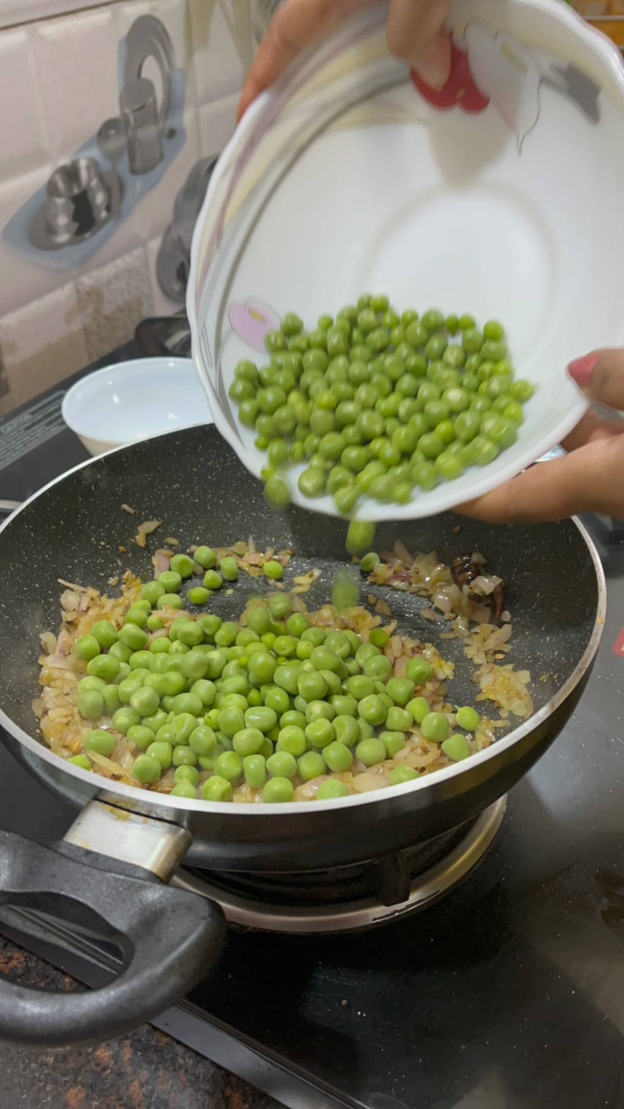 Image of Add the green peas and cook for 2-3 minutes until...