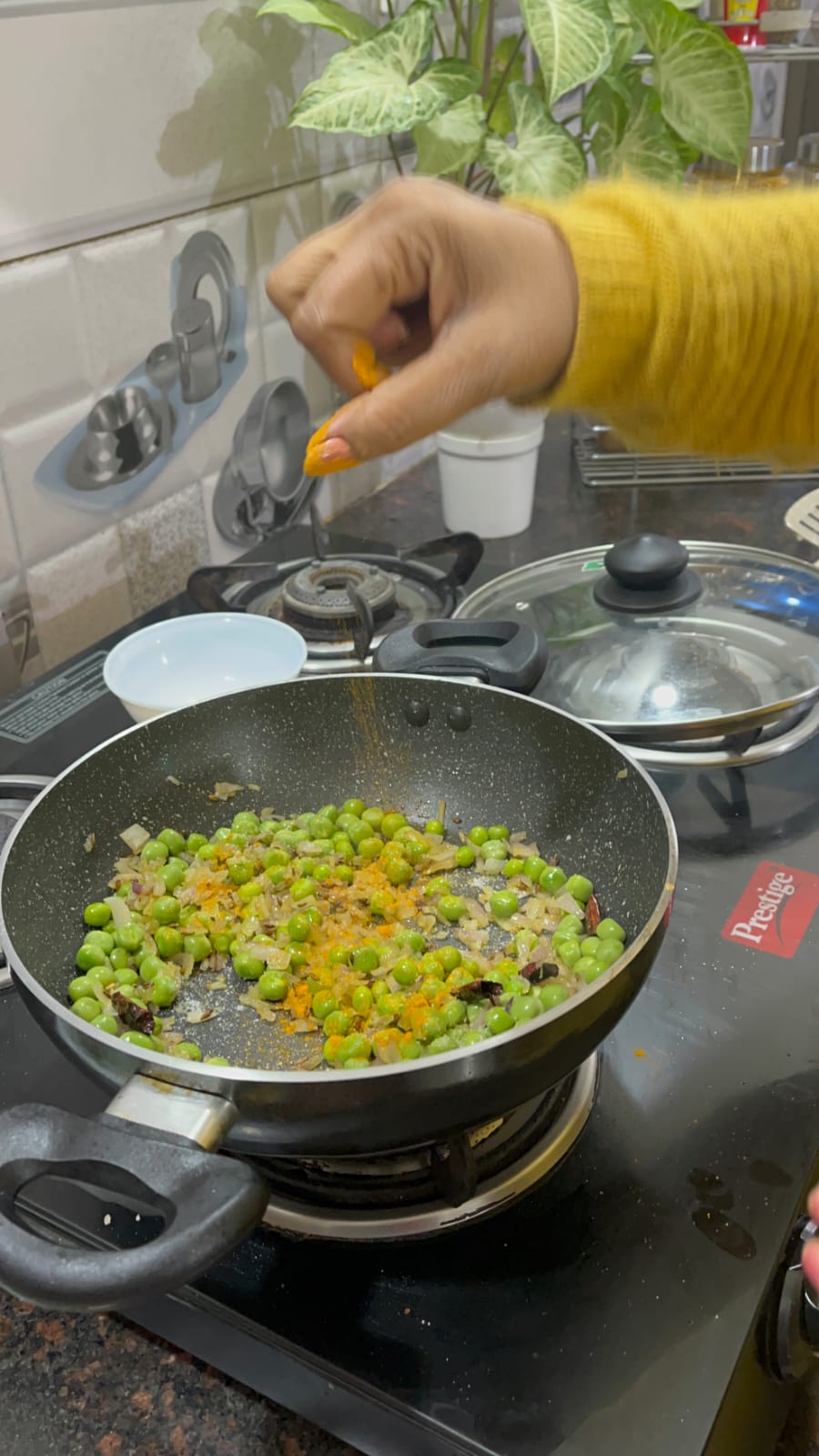 Image of Saute peas and onion by adding salt and turmeric powder