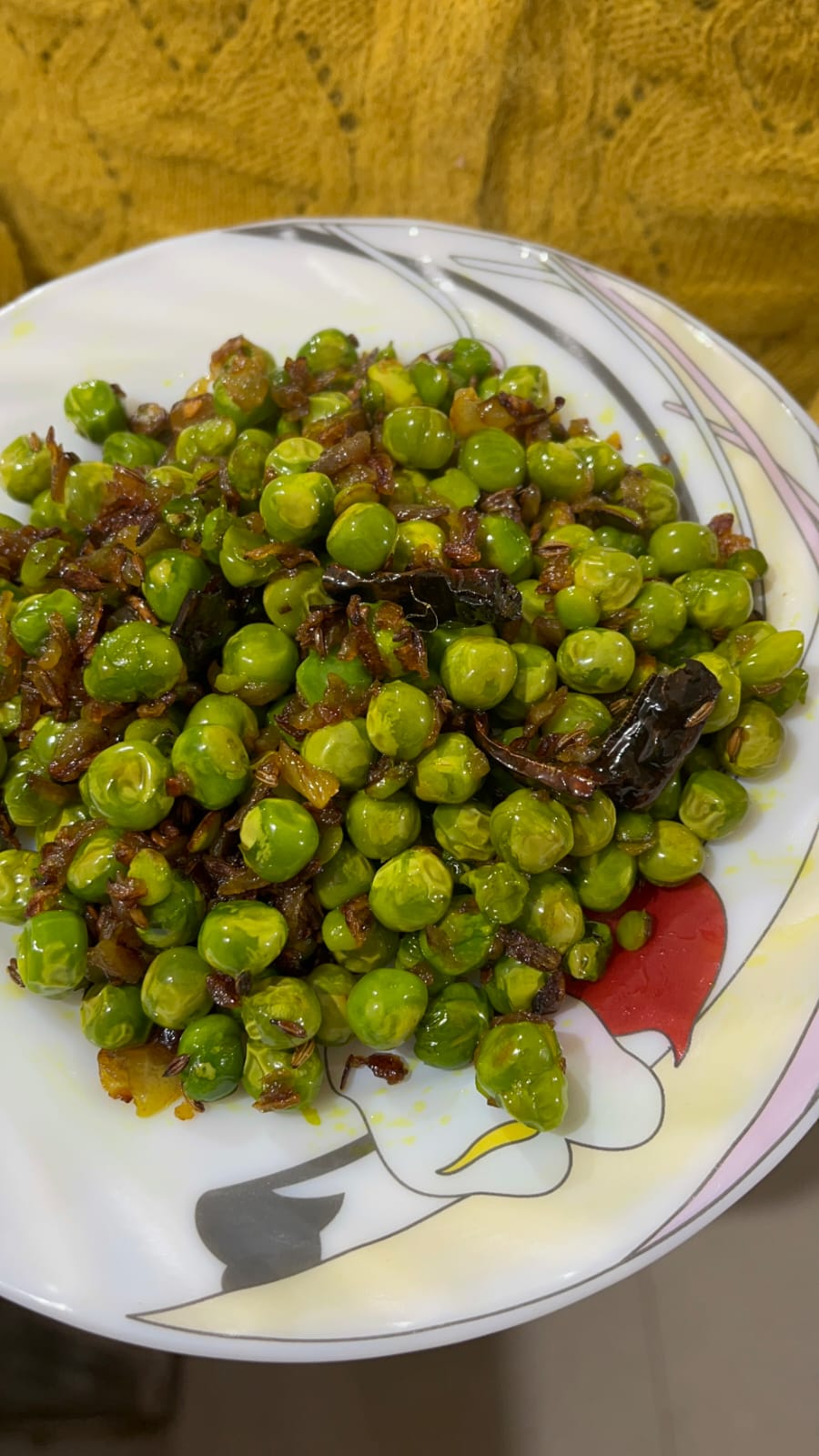 Image of Remove sauteed peas