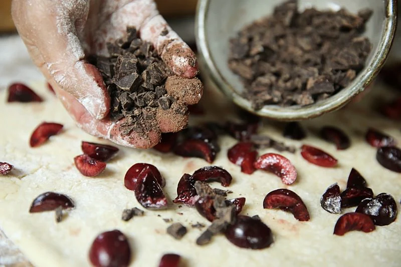 Image of For the final filling, sprinkle the chocolate over and around...