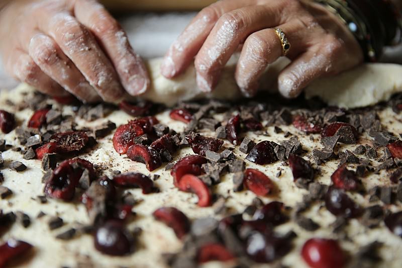 Image of Begin to fold the dough on itself as if you...