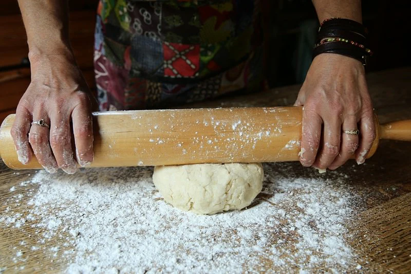 Image of Flour the work surface and the dough and gently roll...