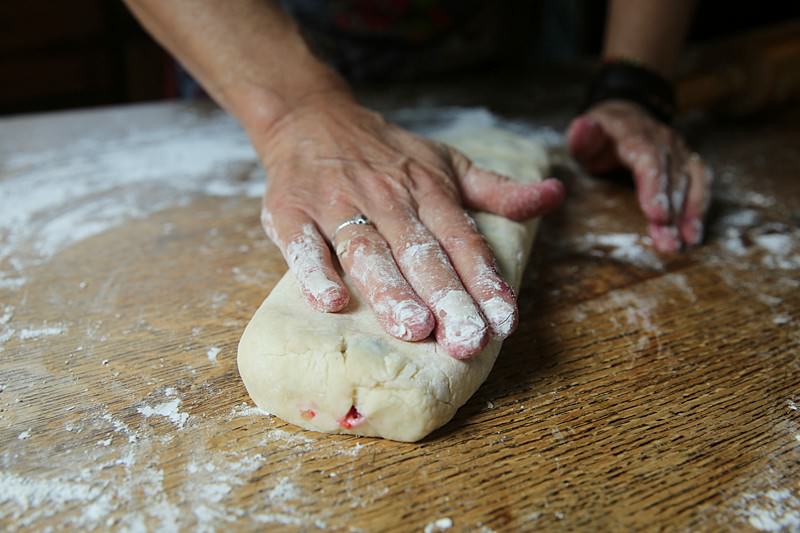 Image of Gently press down the rolled dough with your hands or...