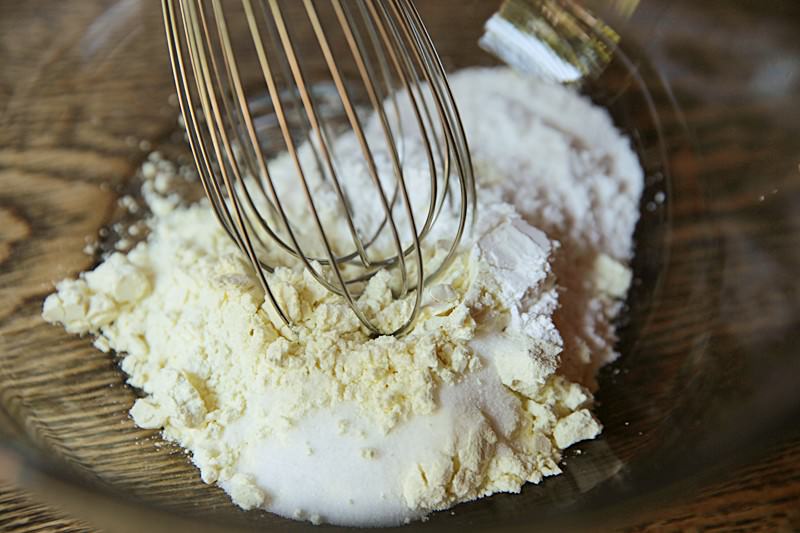 Image of Combine the buttermilk powder, baking powder, salt, and sugar in...