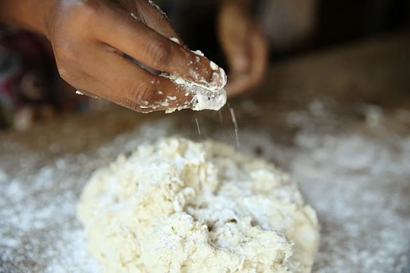 Image of Scrape out the remaining dough from the bowl.