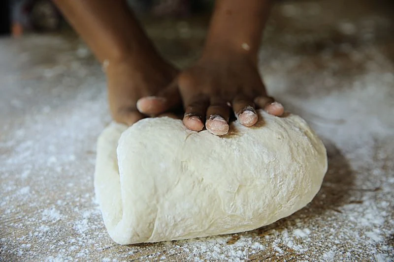 Image of Carefully knead the dough into itself until it is no...