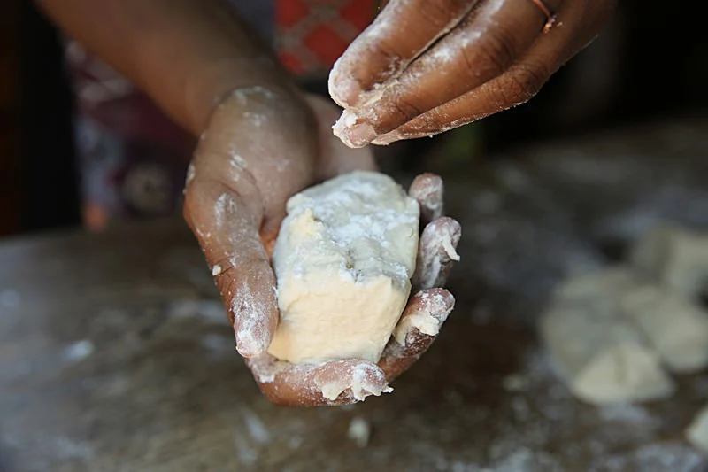 Image of With a dough cutter, divide the dough into equal pieces.