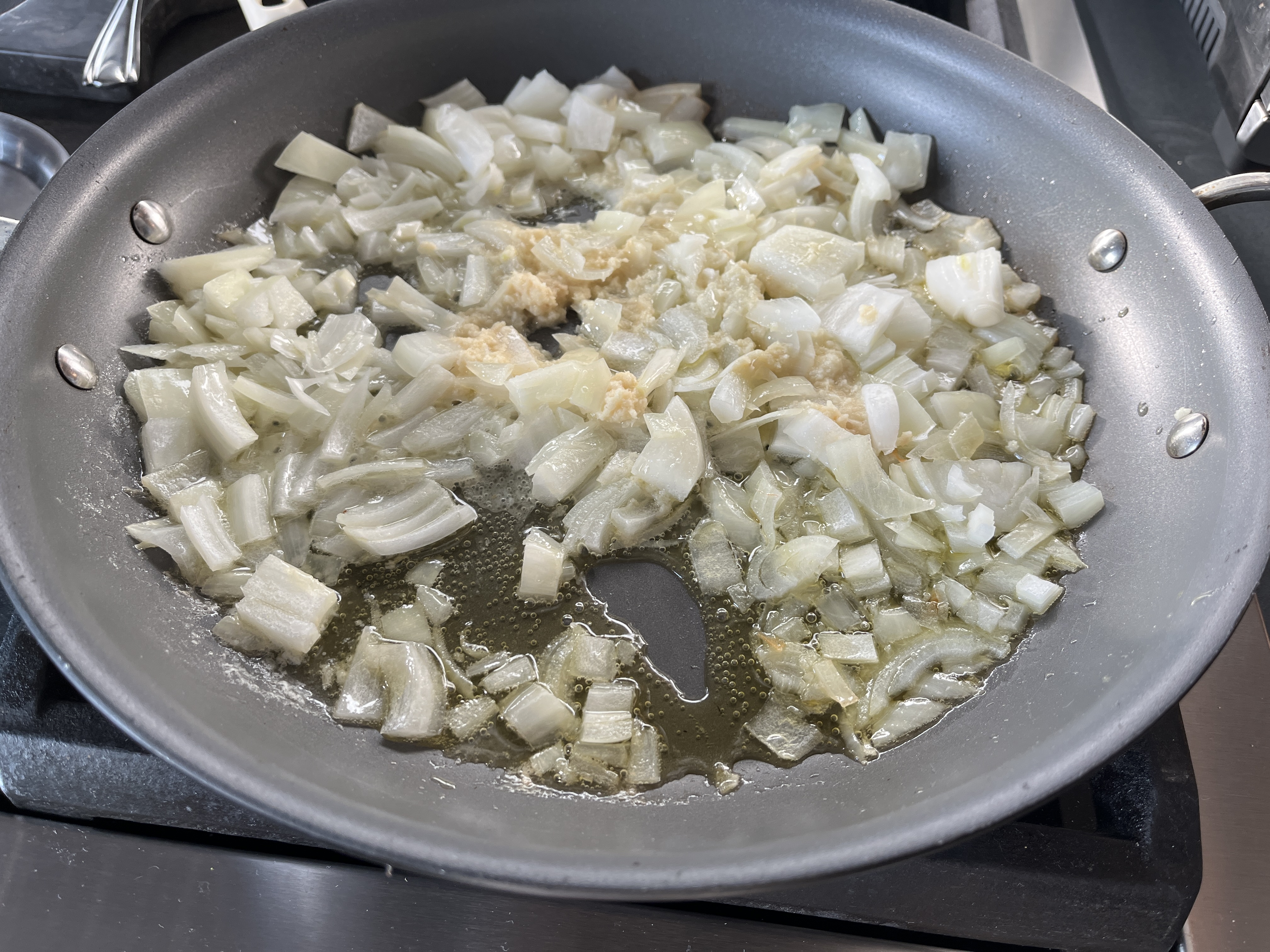 Image of In a pan over medium heat, add oil and butter....