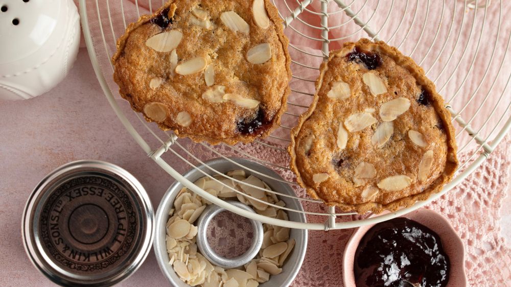 Image of Spread the Tiptree Raspberry Seedless Conserve over the cooked pastry...