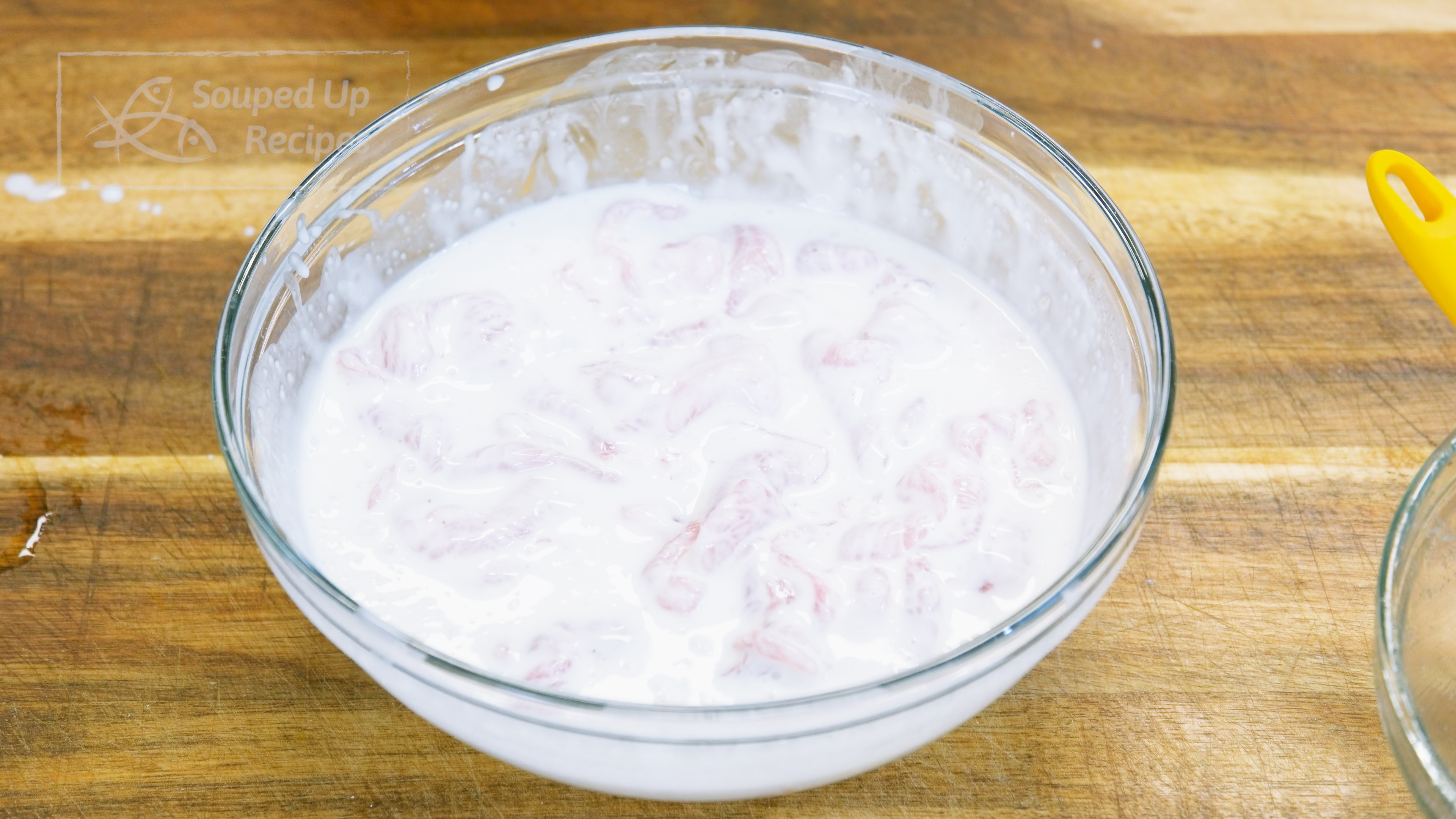 Image of In a separate bowl, mix the cornstarch with the water until it...