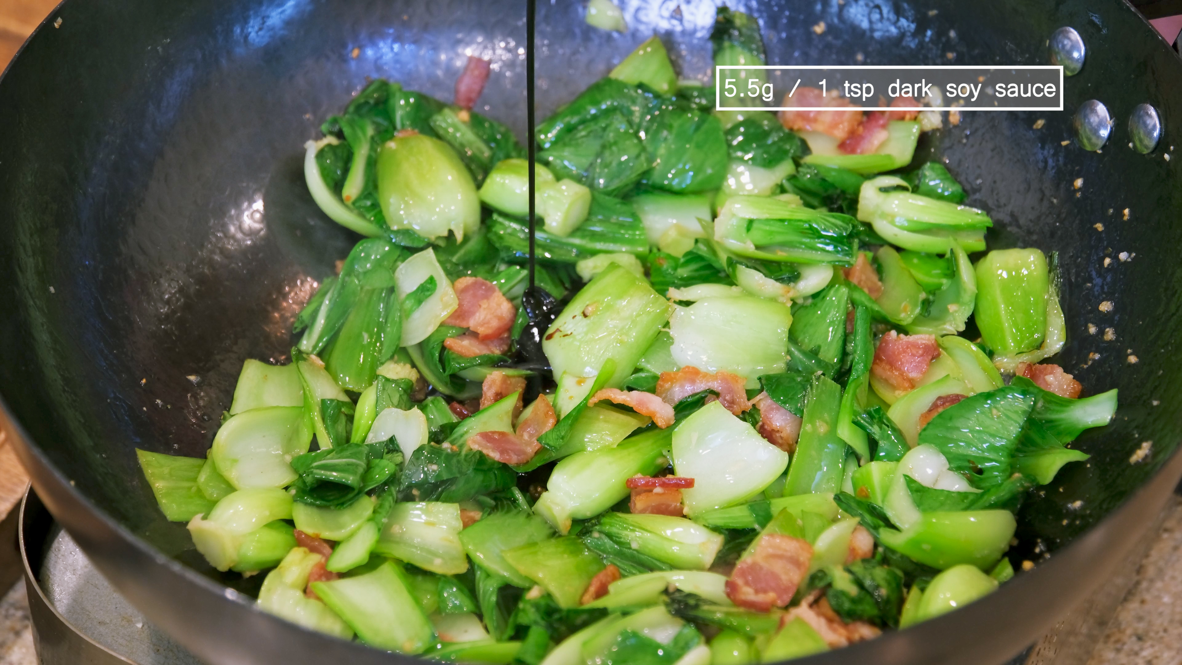 Image of Toss in the bok choy leaves and mix until the...