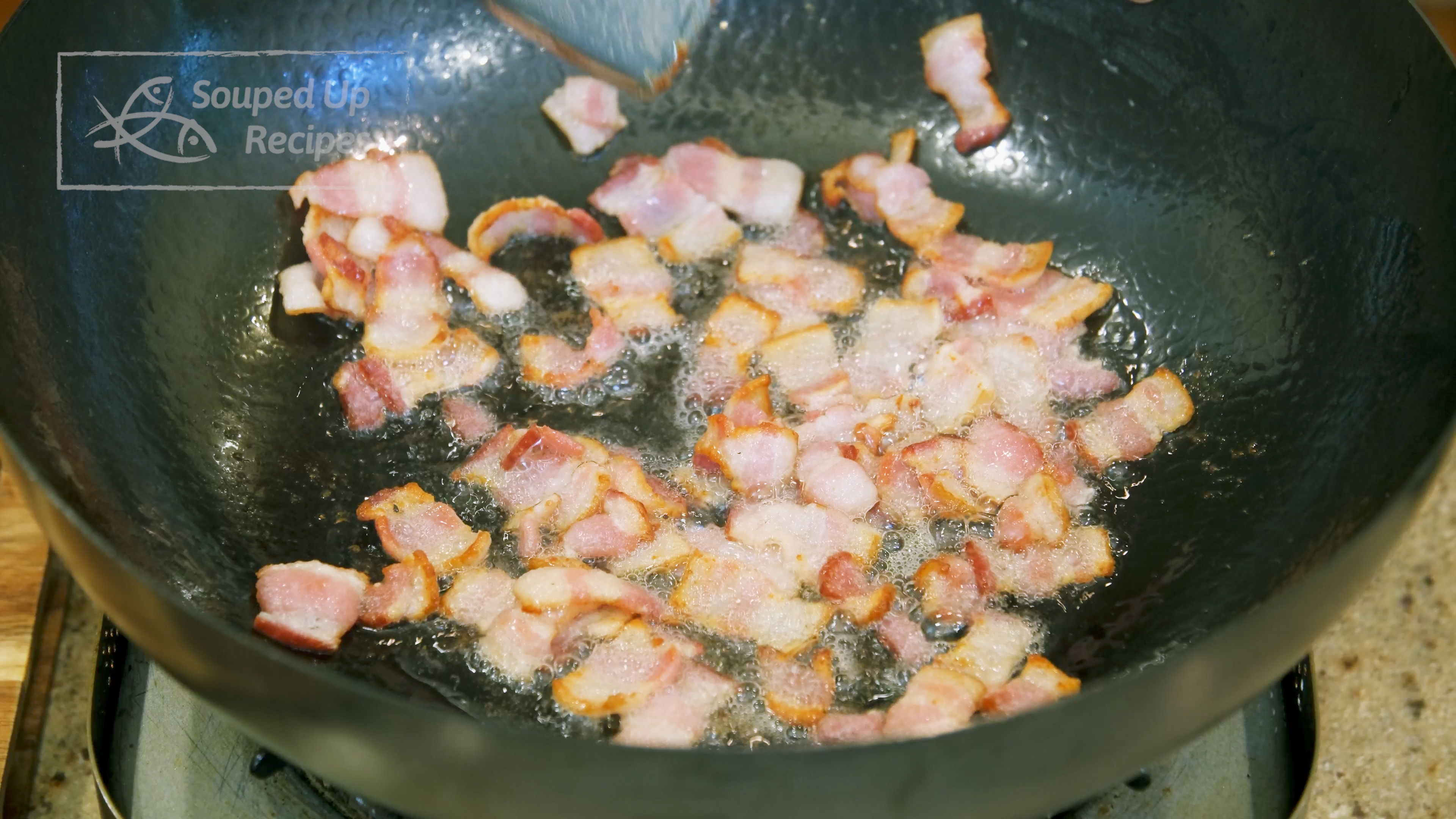 Image of Turn the heat to medium and preheat the wok for...