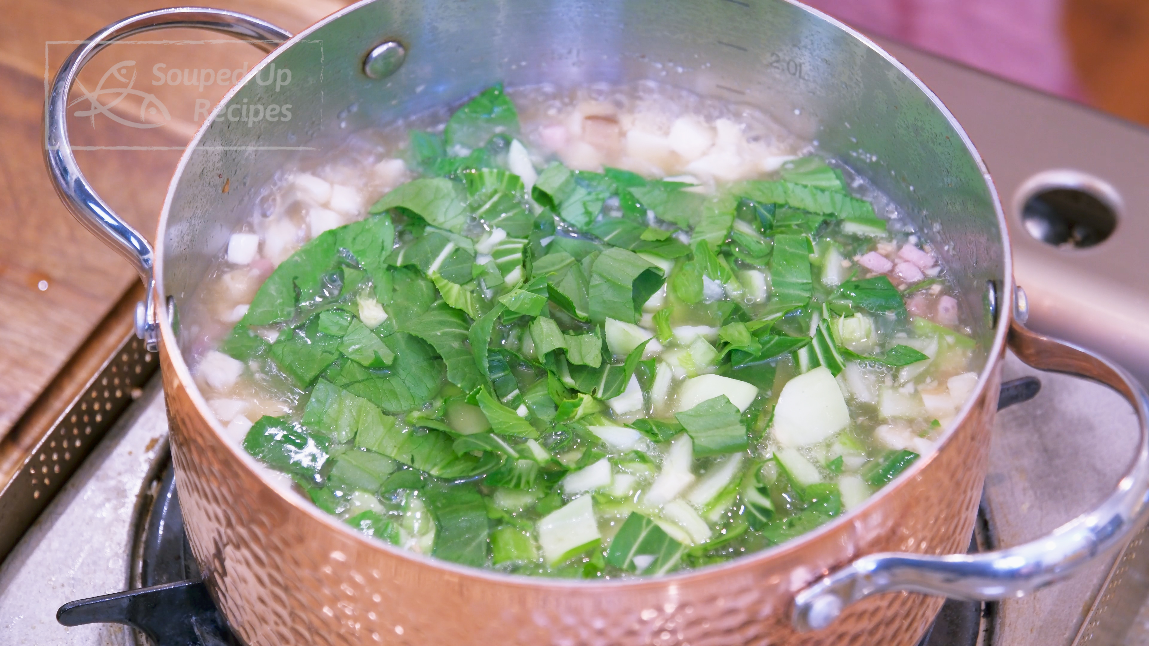 Image of Rinse 6 oz of baby bok choy and dice finely....