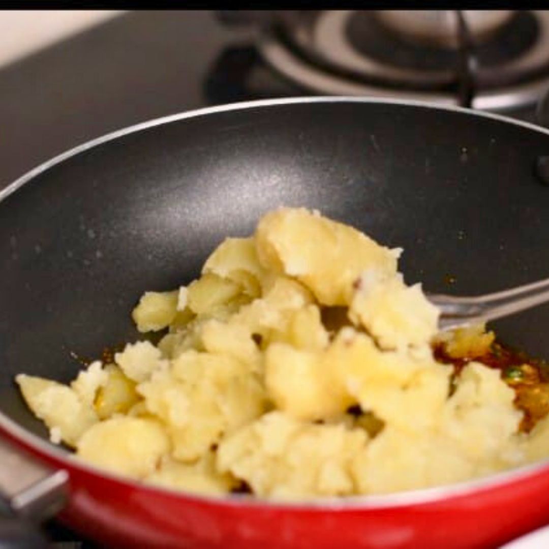 Image of Add the mashed potatoes to the pan and mix well...