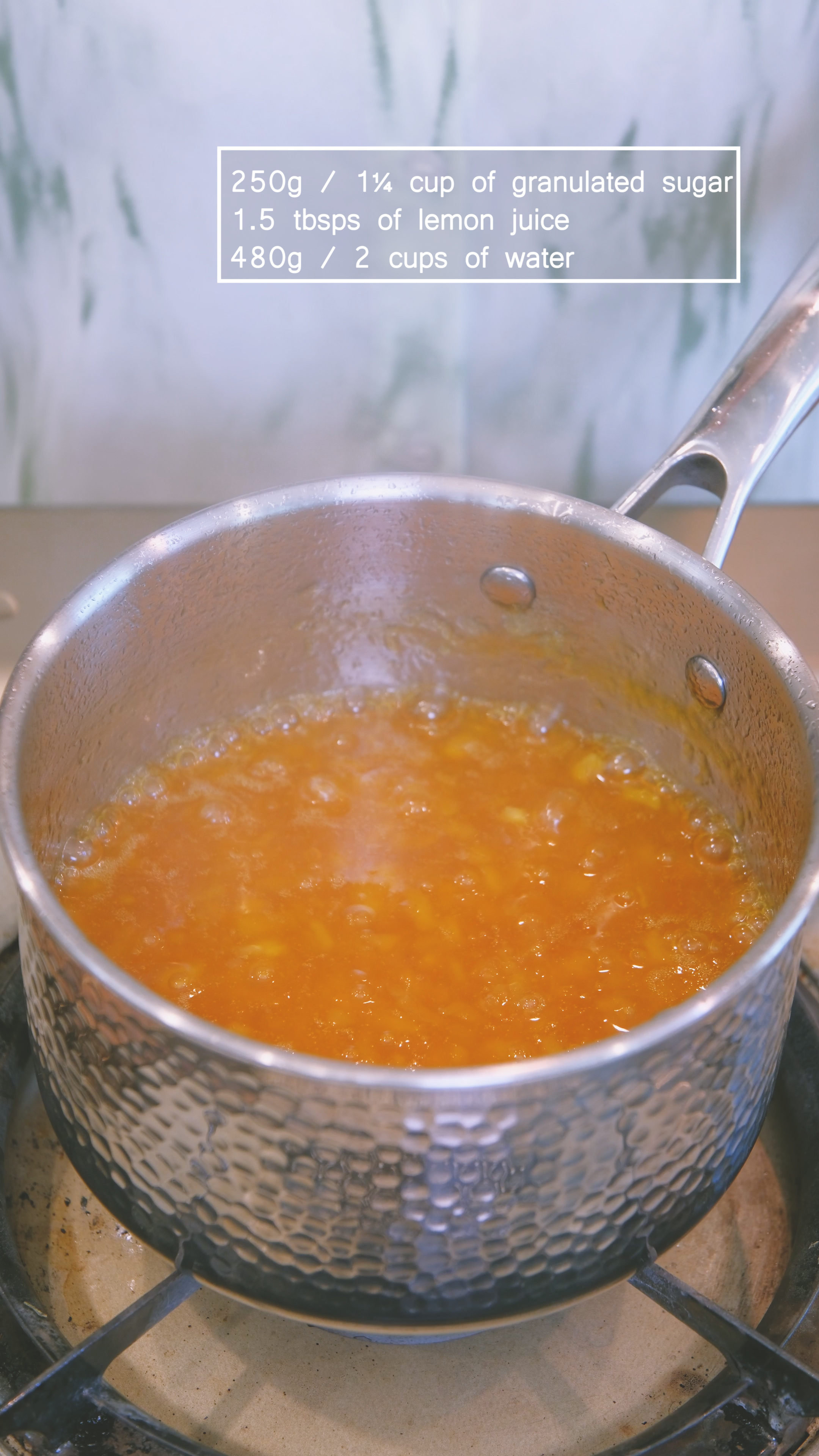 Image of Drain the lemon rinds and transfer them into a saucepan....