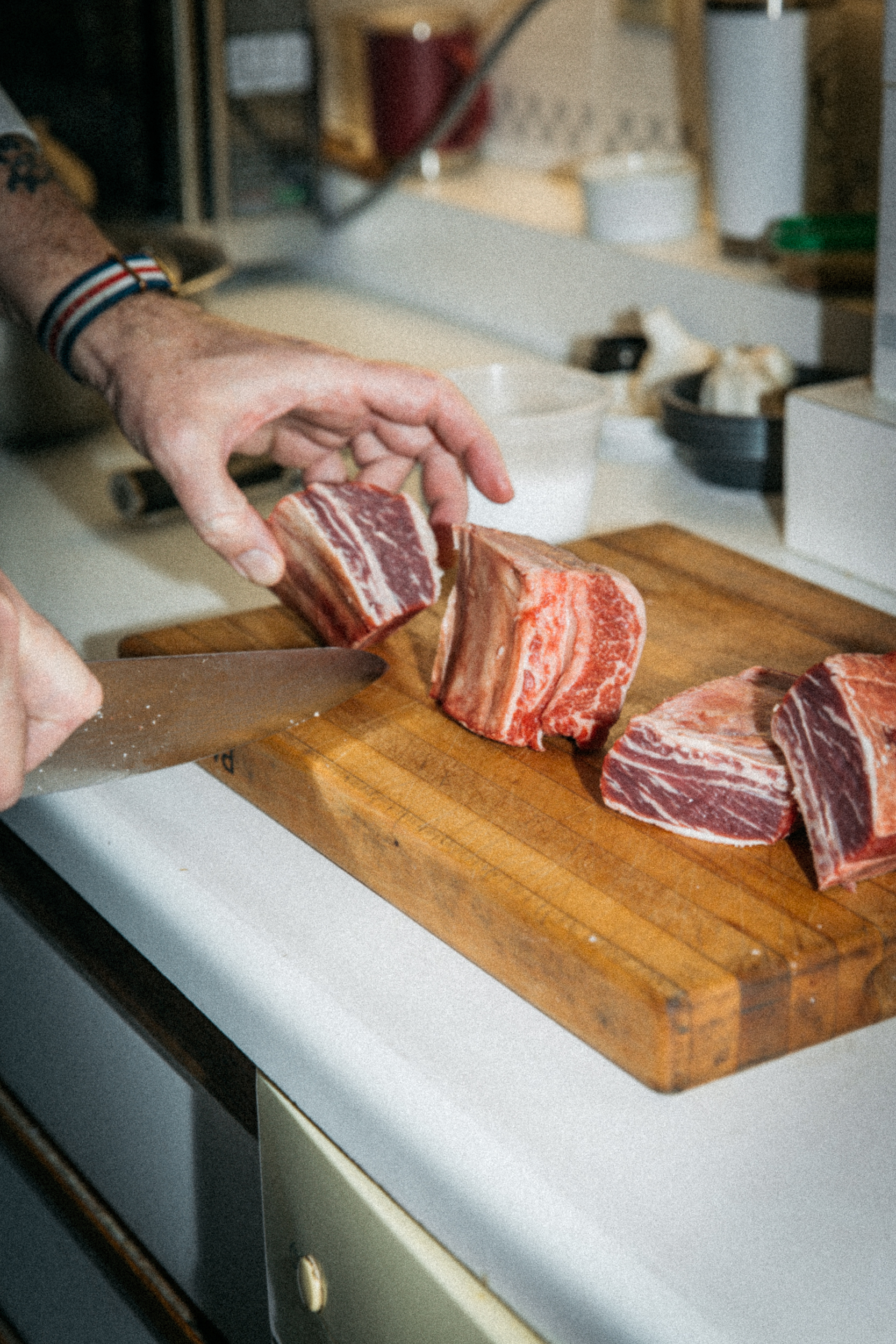 Image of Cut the short ribs into single-bone pieces and add them...