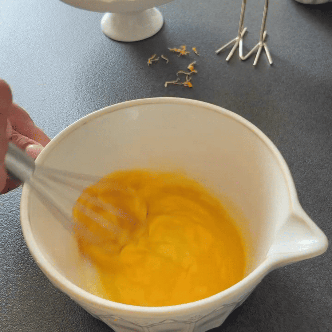 Image of In a bowl, whisk together the eggs, sugar, vegetable oil,...