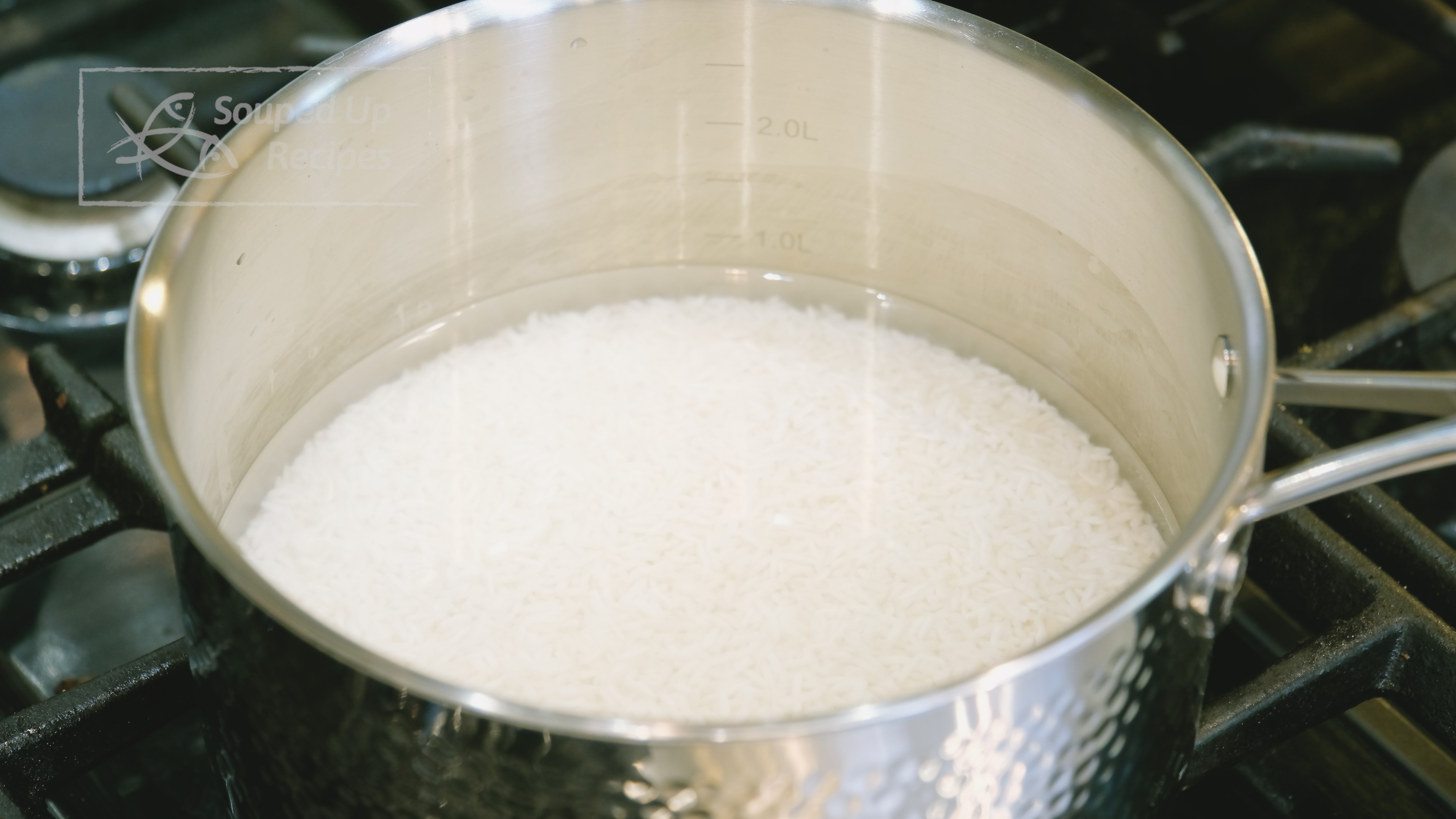 Image of Rinse the jasmine rice with water and drain thoroughly. Add...