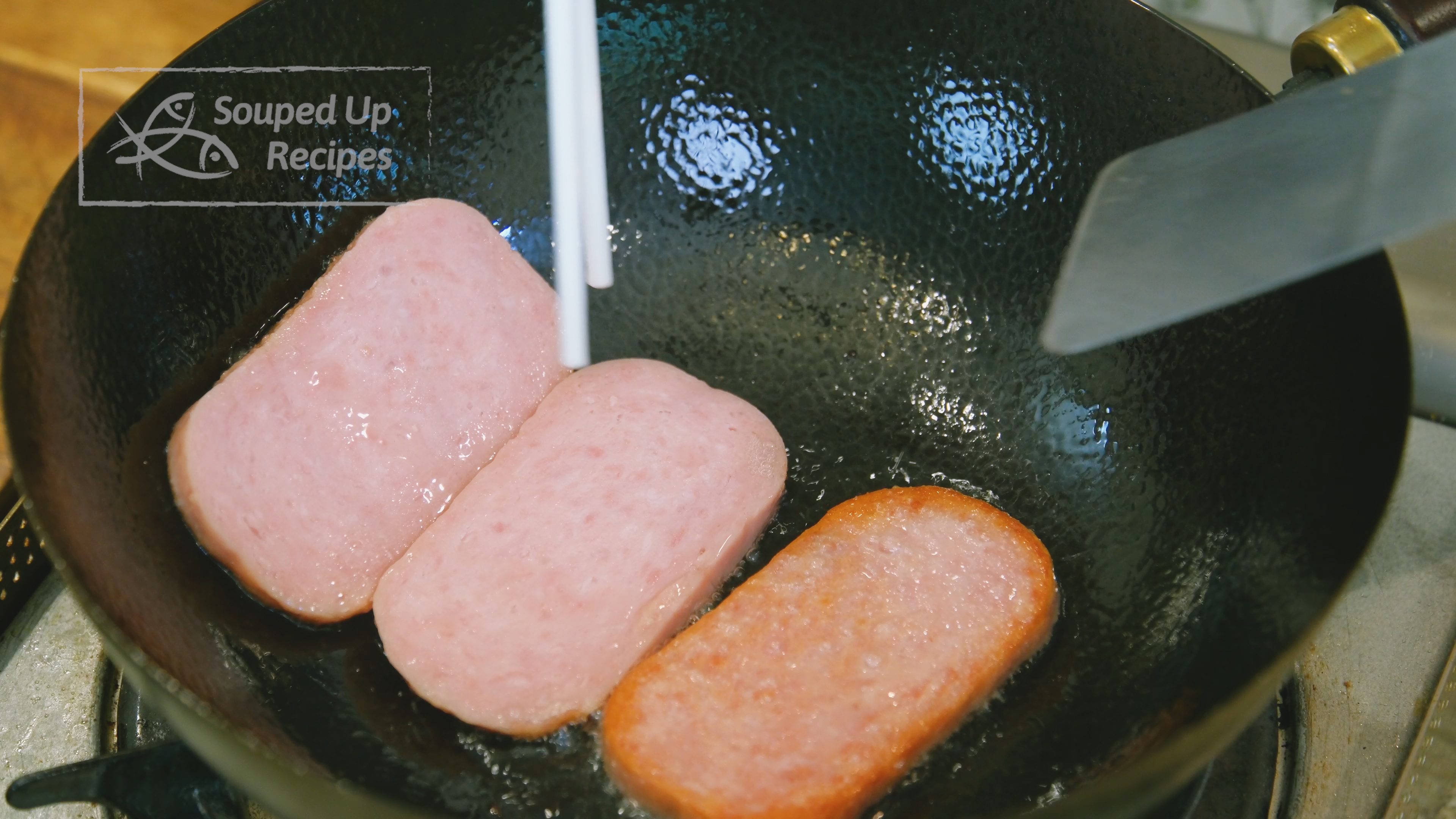 Image of Add 3 slices of spam, about 1/4 of an inch...