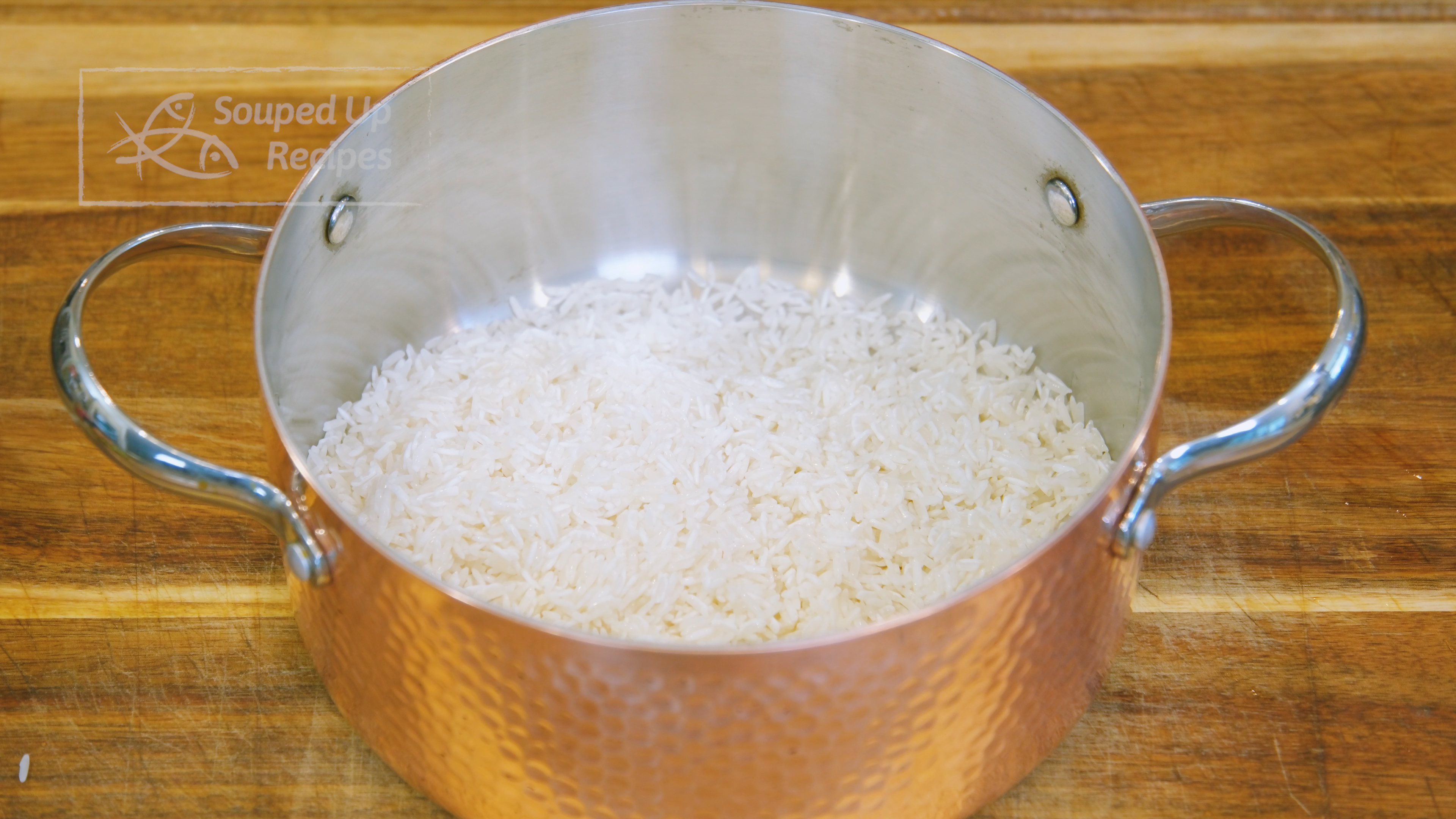 Image of Rinse the jasmine rice with water and drain thoroughly. Add...