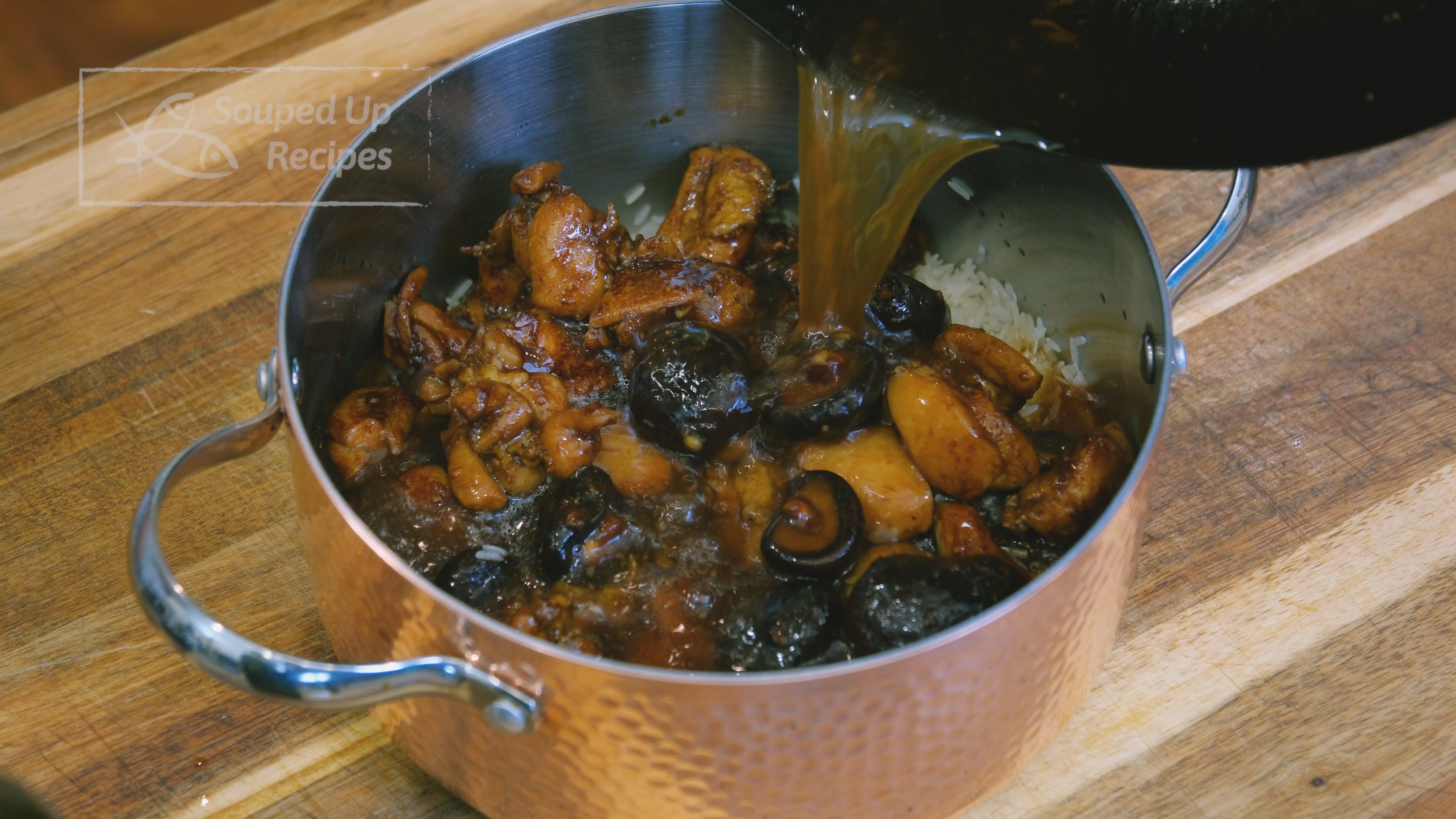 Image of Transfer all the ingredients from the wok into the pot...