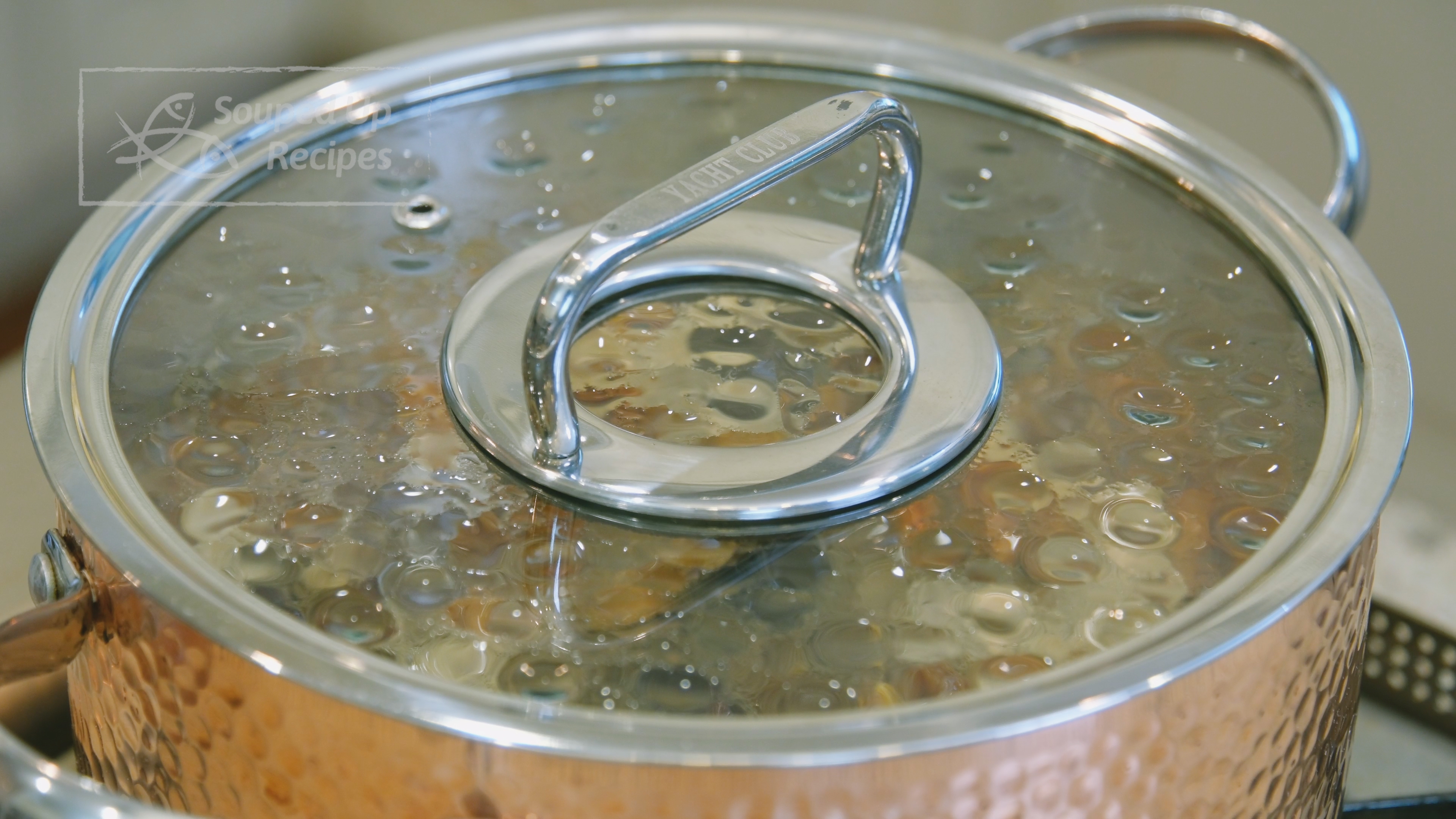 Image of Place the pot onto the stove and turn the heat...