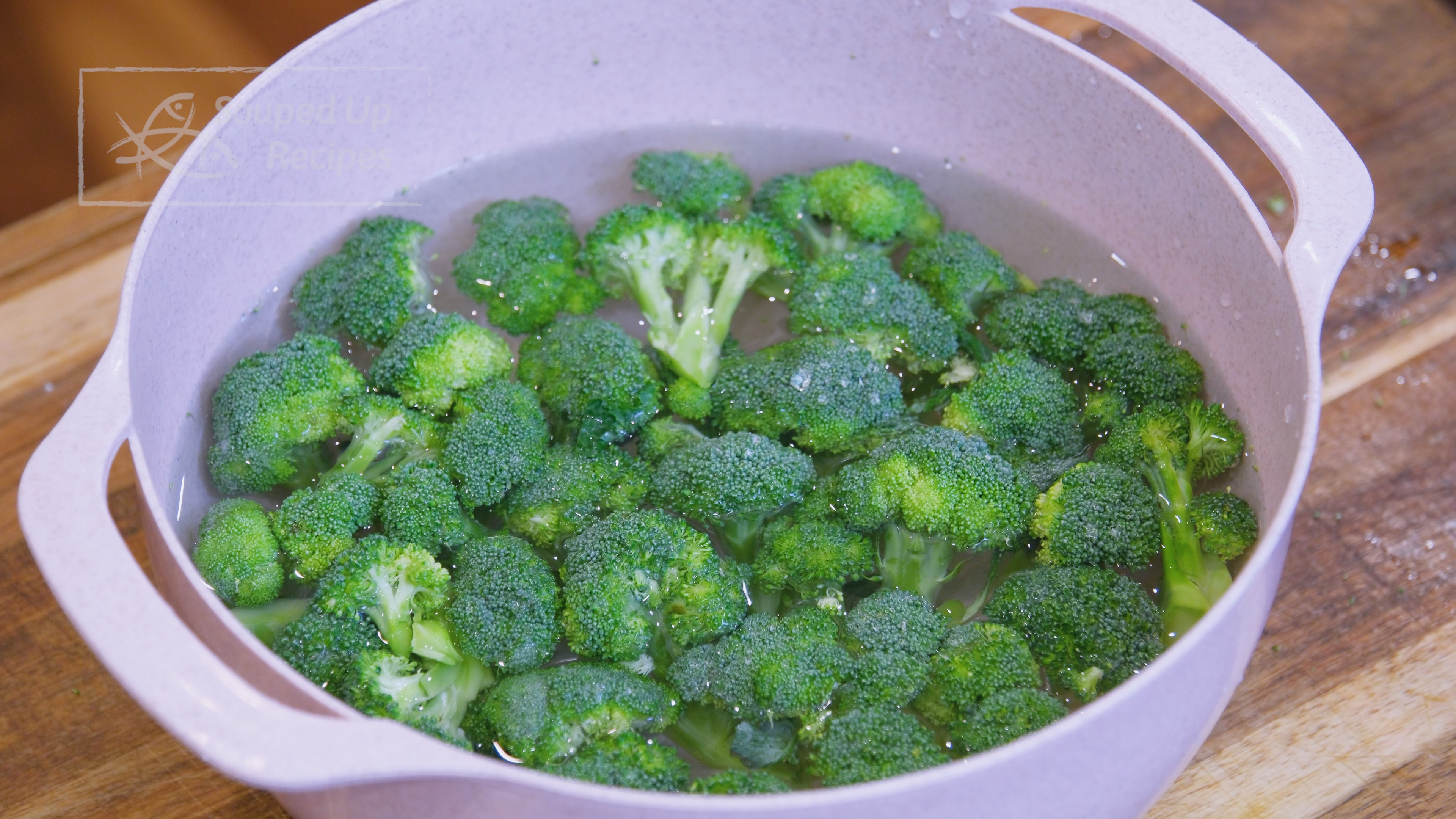 Image of Cut the broccoli into bite-size florets. Fill a big bowl...