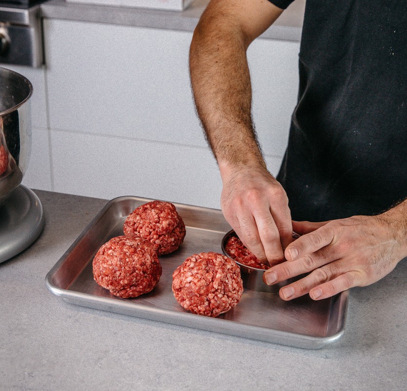 Image of Shape 6 oz of the freshly ground Wagyu into a...