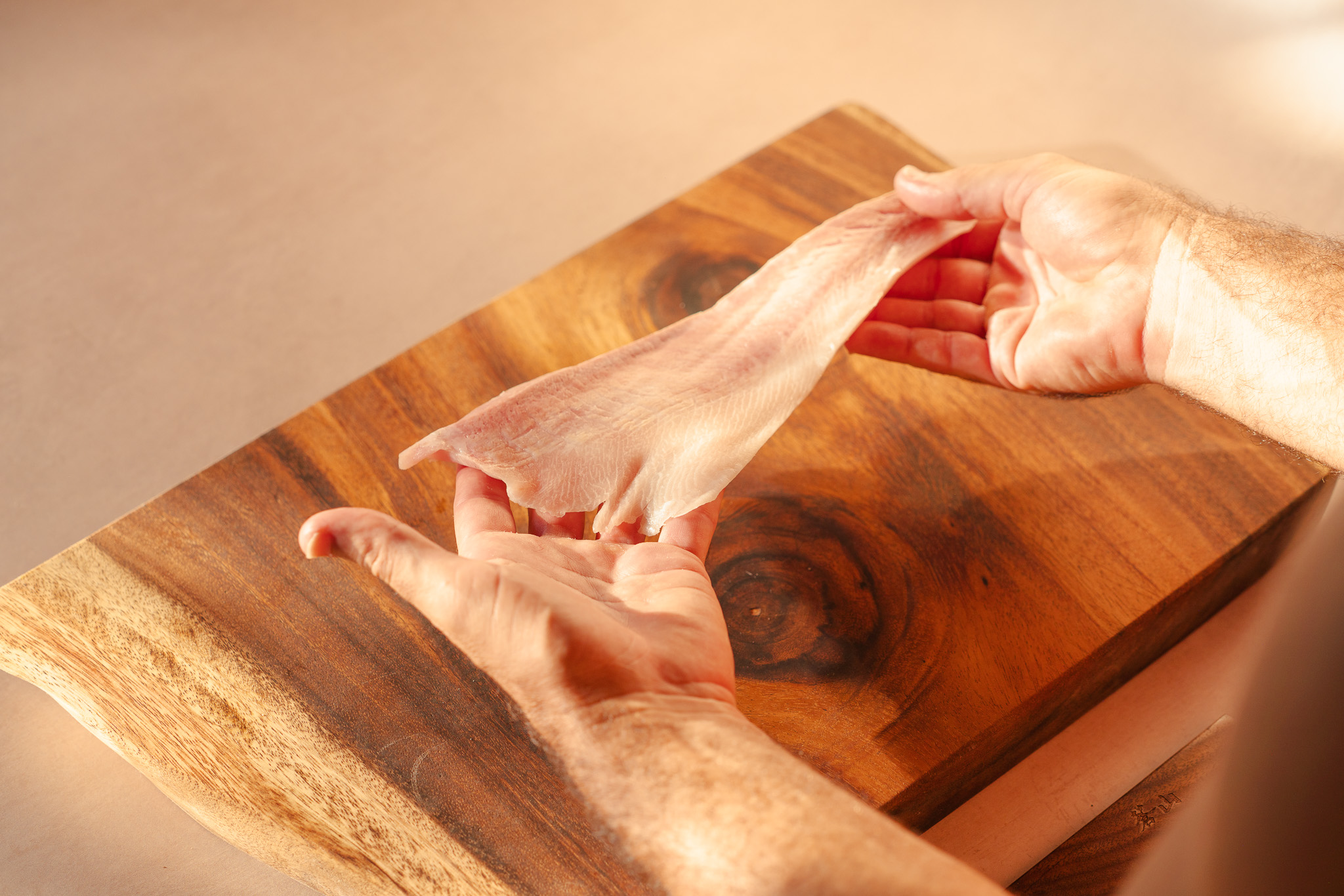 Image of Pat the thawed fillet dry.