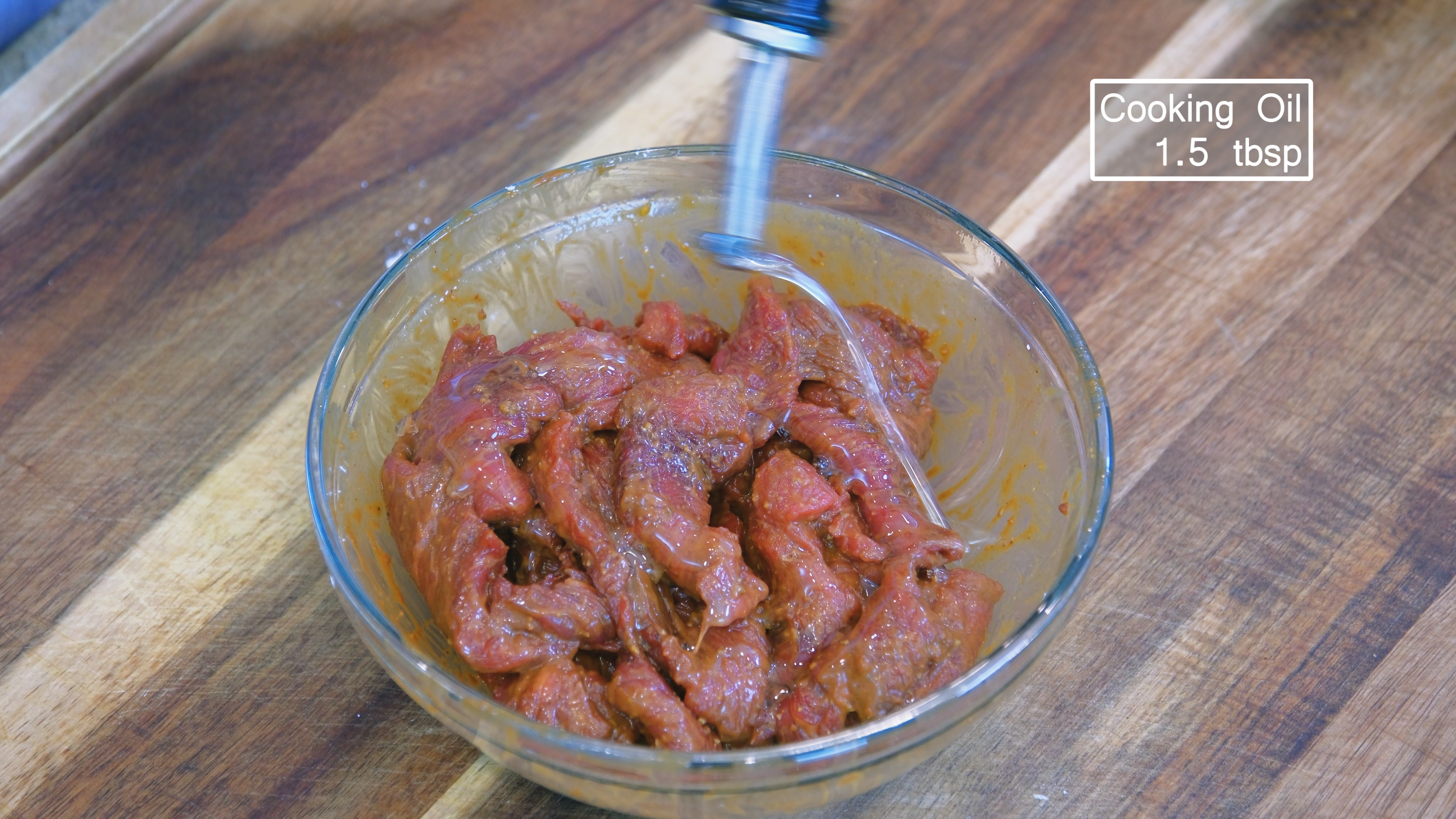 Image of Add 1.5 tablespoons of cooking oil and mix to coat...