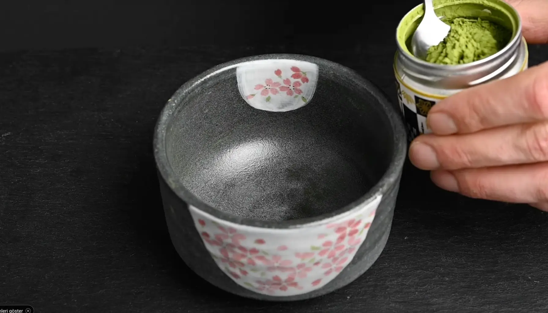 Image of Scoop 1 teaspoon (2 g) of ceremonial matcha powder into...