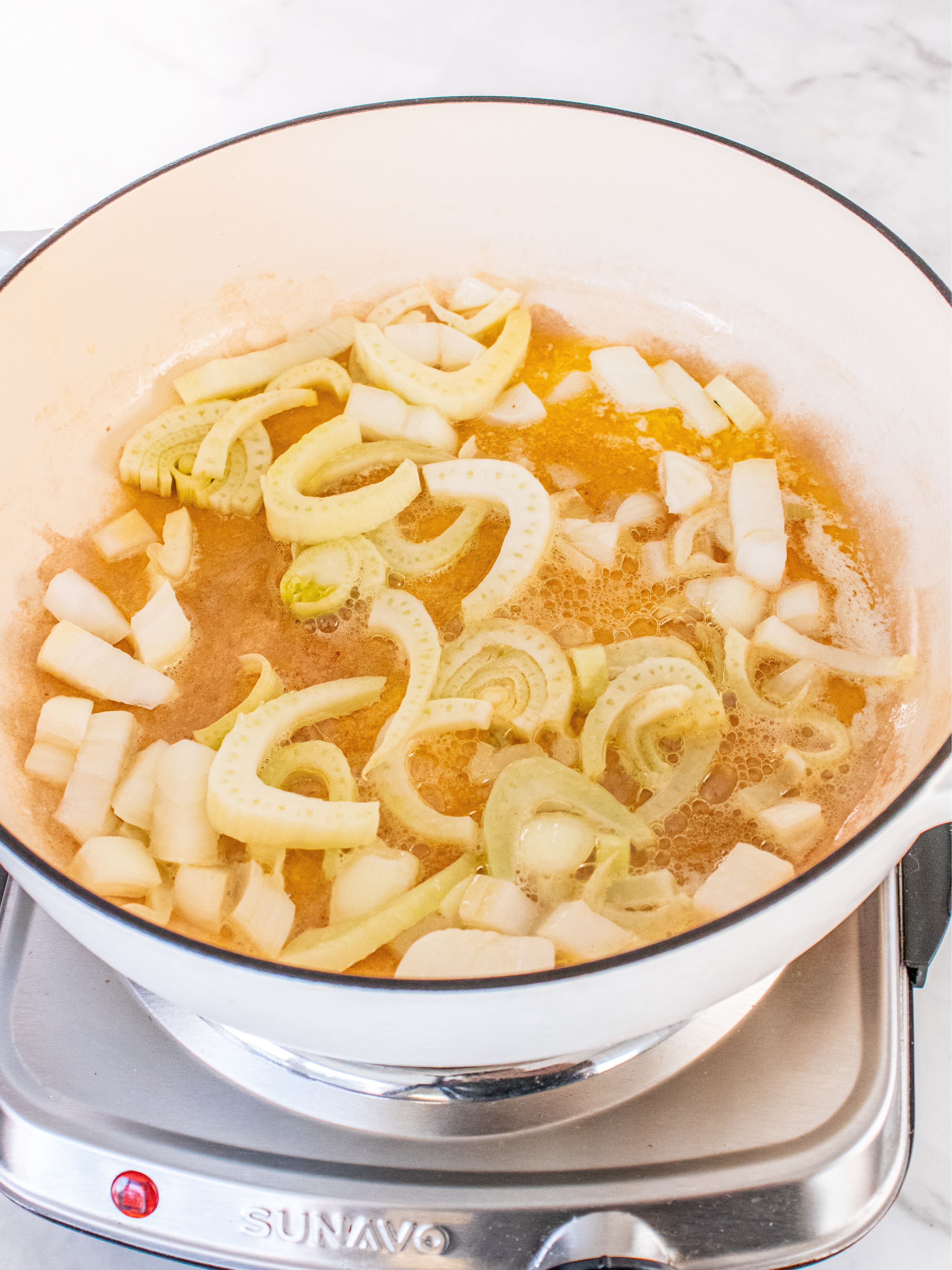 Image of Melt butter over medium heat in a large pot or...