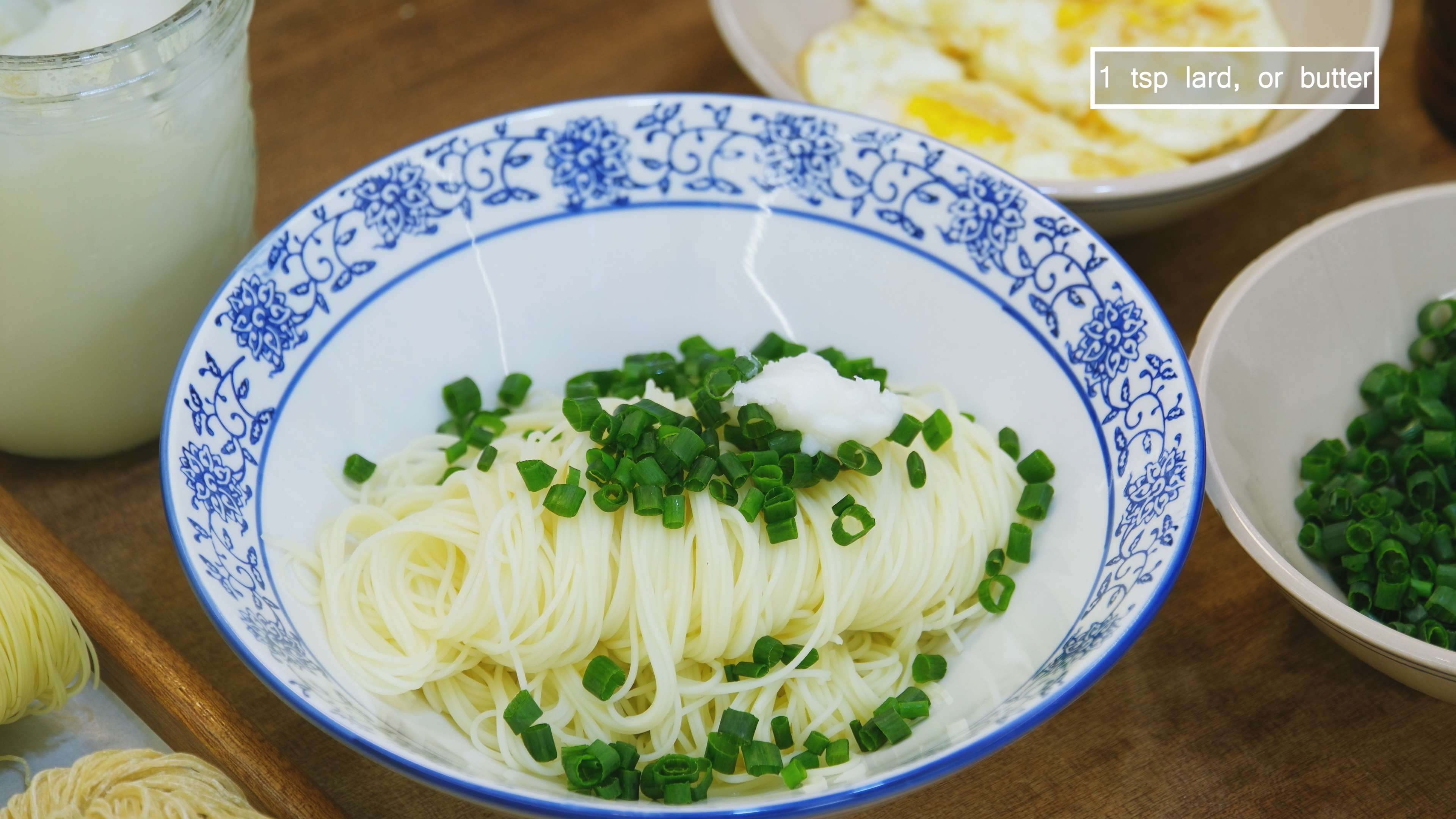 Image of Transfer the noodles into your serving bowl, sprinkle the reserved...