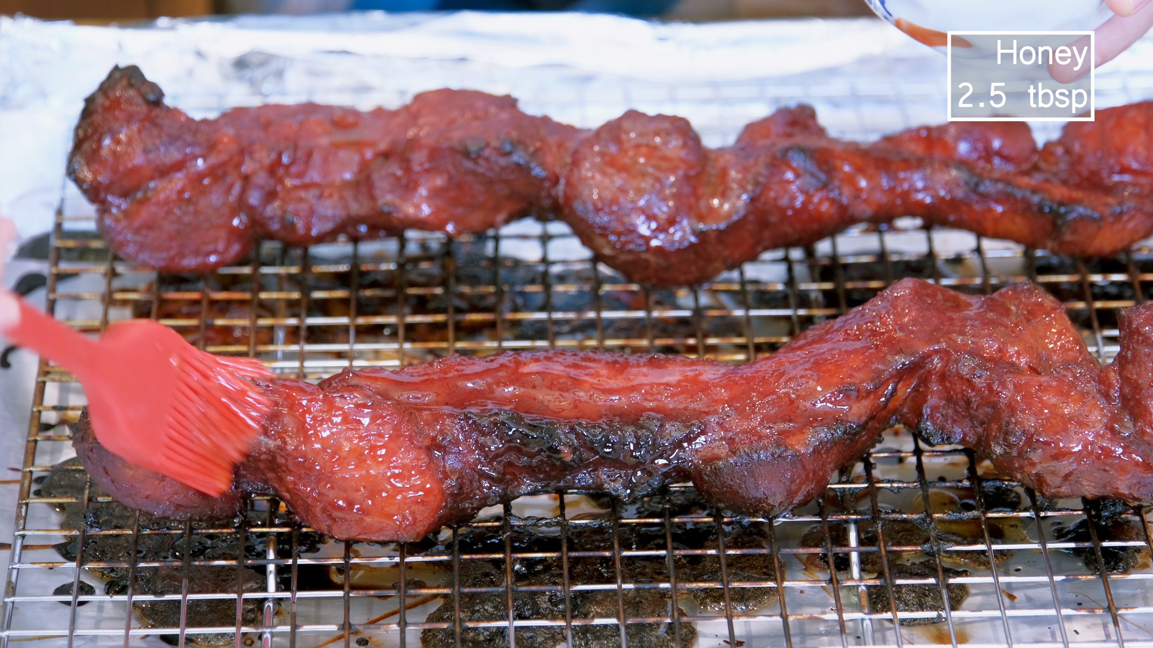 Image of Remove the char siu from the oven again and brush...