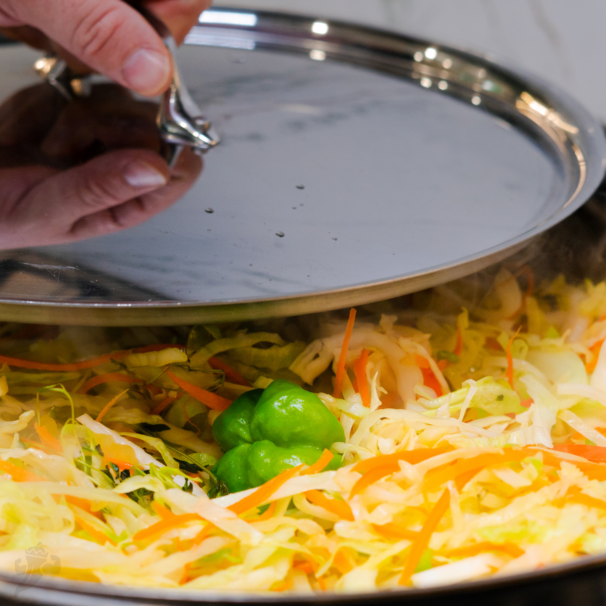 Image of Stir cabbage into the pan until thoroughly combined. Cover the...